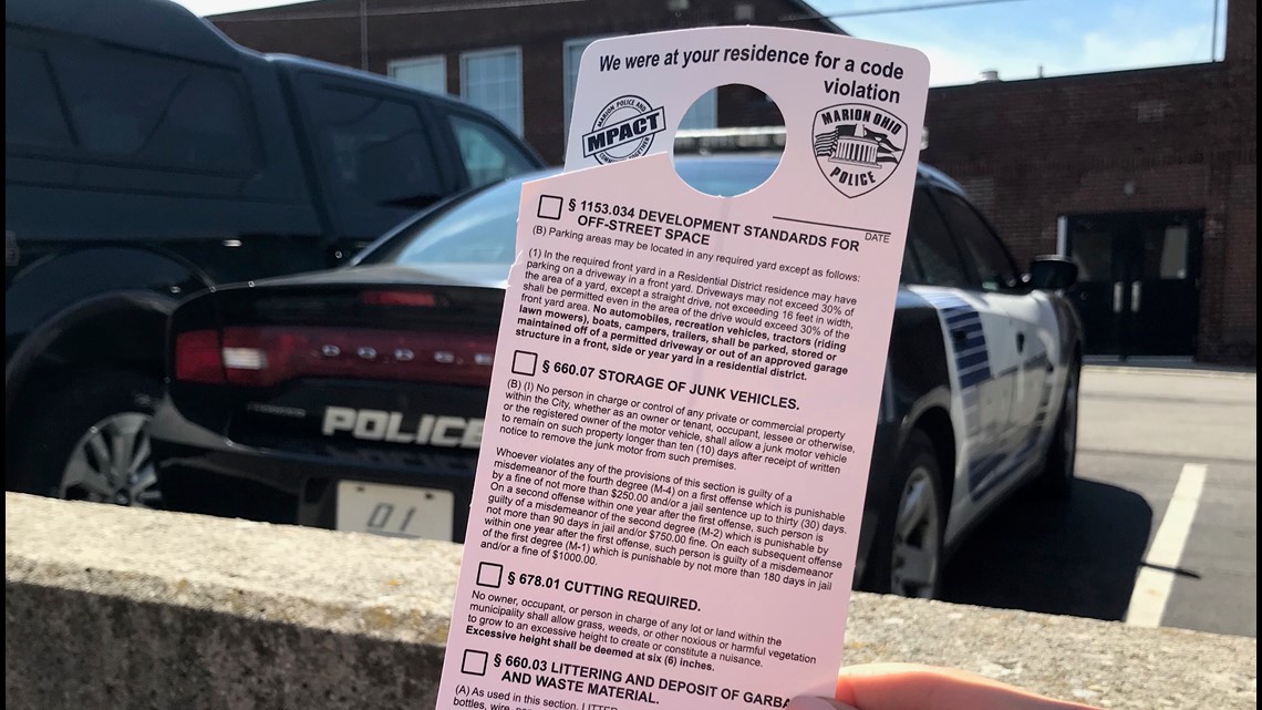 Marion enforcing code violations, including grass cutting, with door