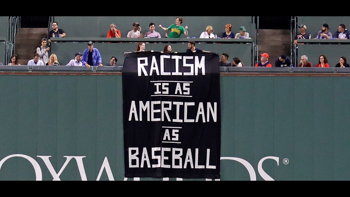 Racism is as American as baseball' banner unfurled over Fenway