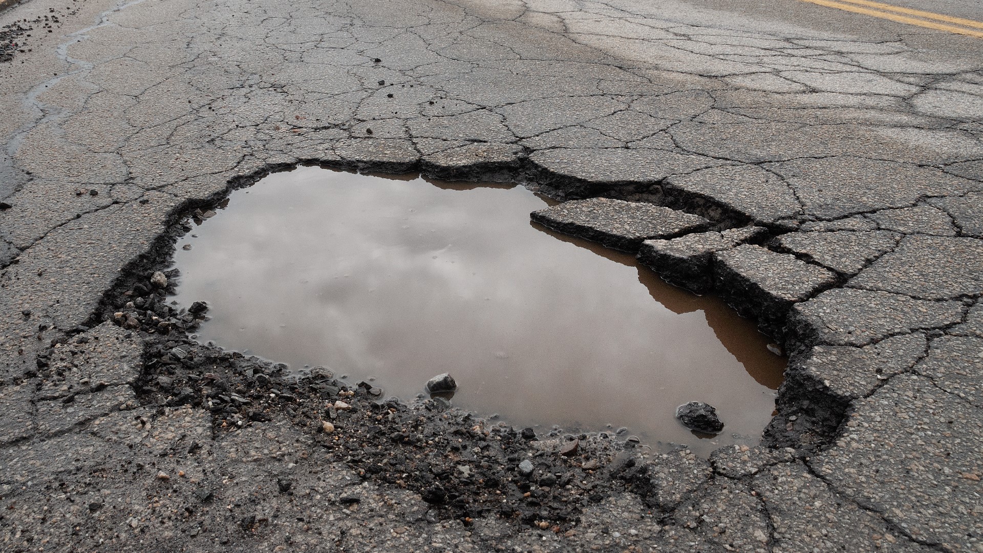 Potholes are popping up everywhere around central Ohio and that's mainly due to the winter weather.