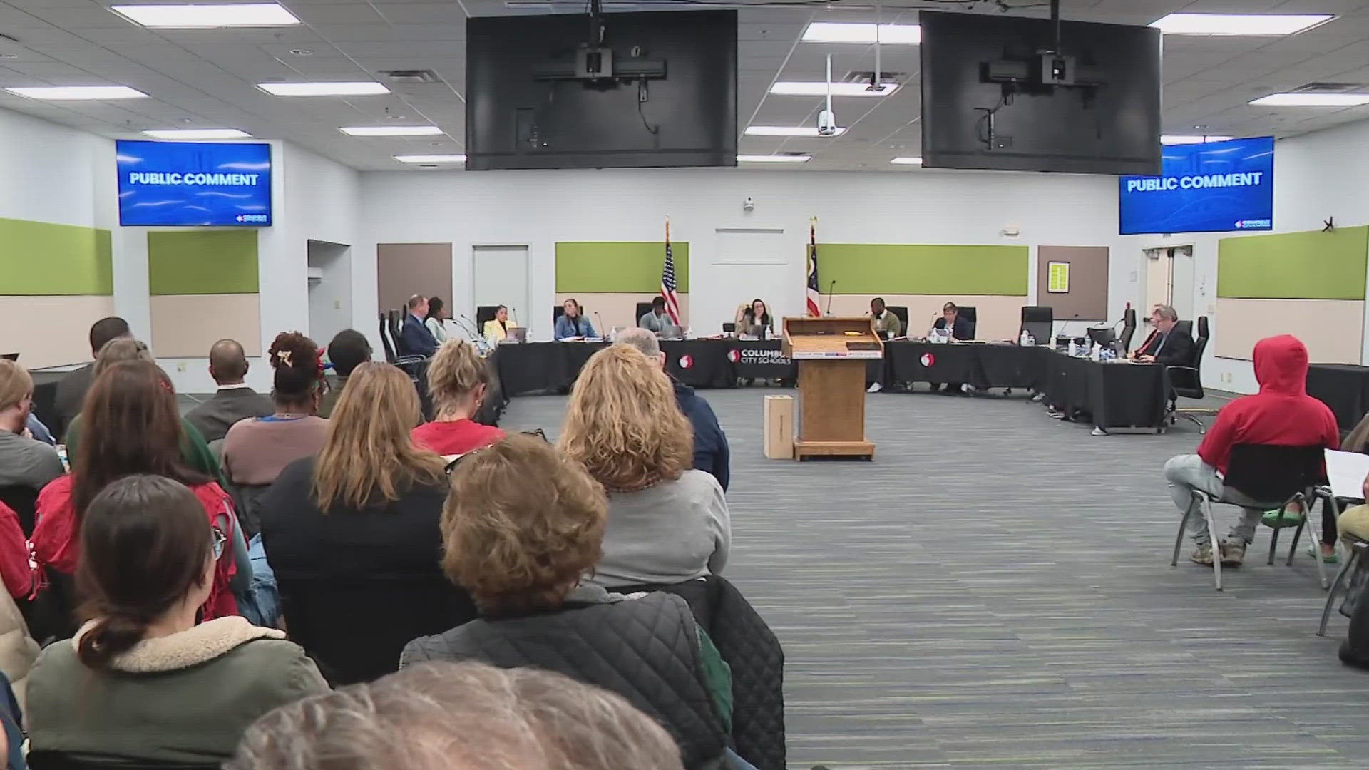 During the meeting on Tuesday, several parents and teachers came forward with statements about the impact the schools have had on them.