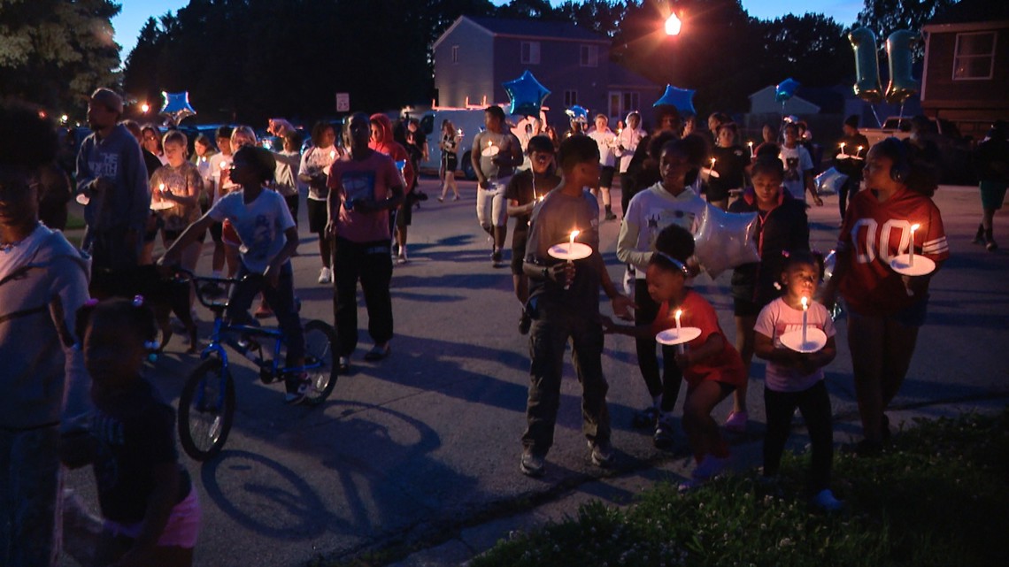 Friends, neighbors hold vigil for 11-year old-girl and her mother killed in Columbus