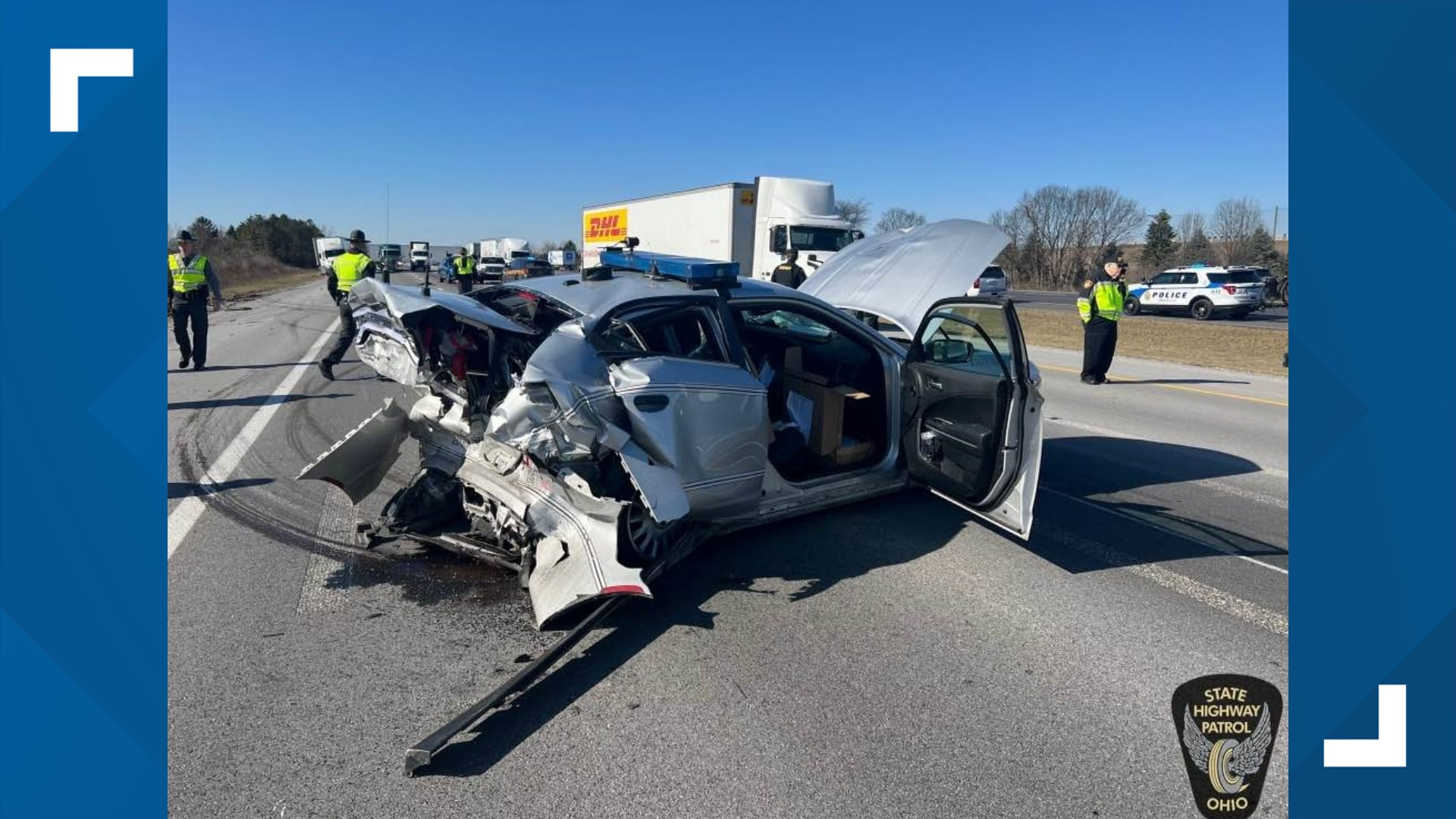 The trooper was removing debris from the road when a vehicle struck his cruiser. The impact caused the cruiser to move forward, hitting the trooper.