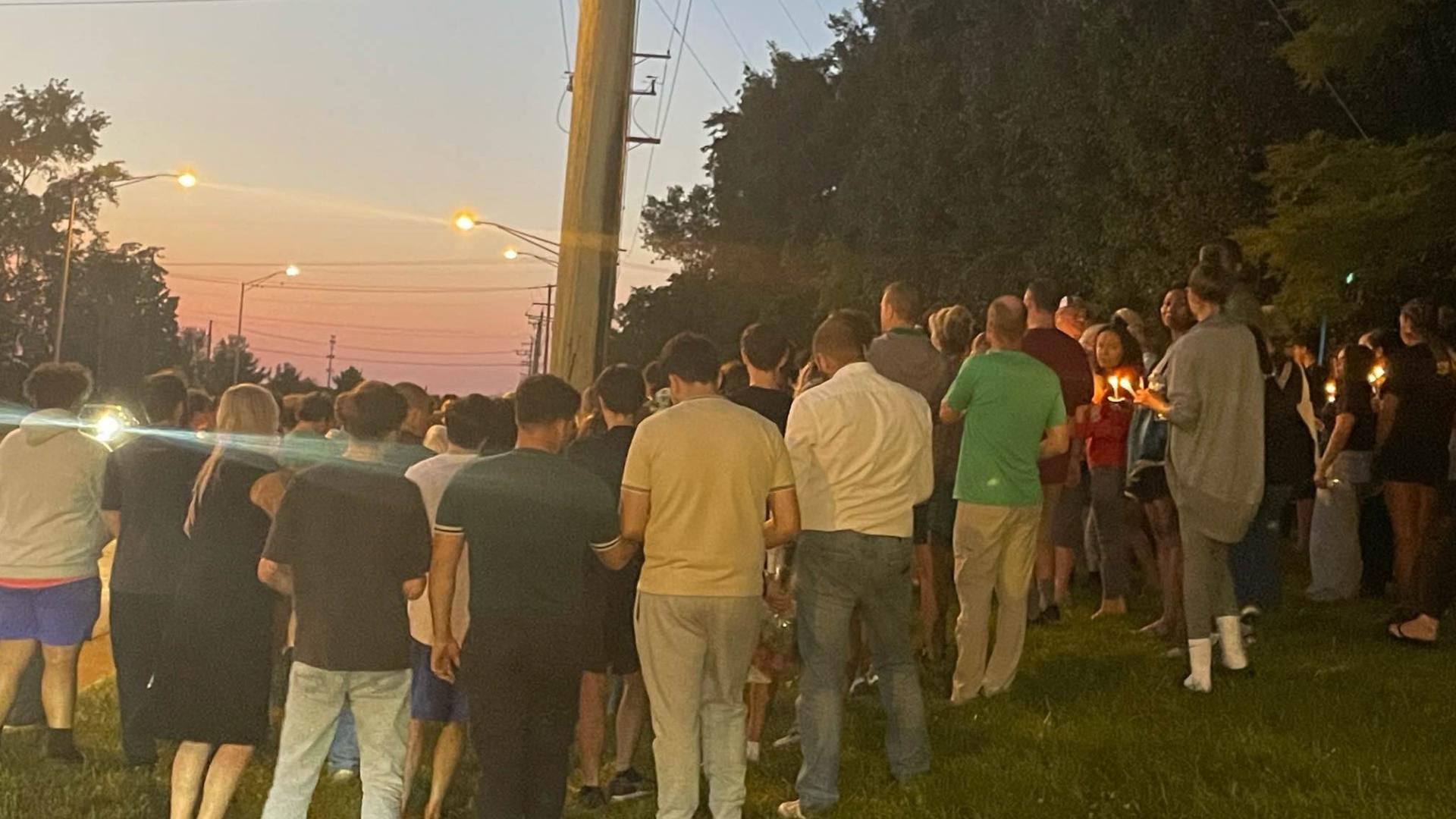 A vigil was held for two Dublin Scioto graduates who died in a car crash on Sawmill Road.