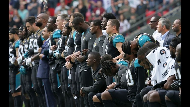 Ravens and Jaguars Players Kneel and Lock Arms During National Anthem