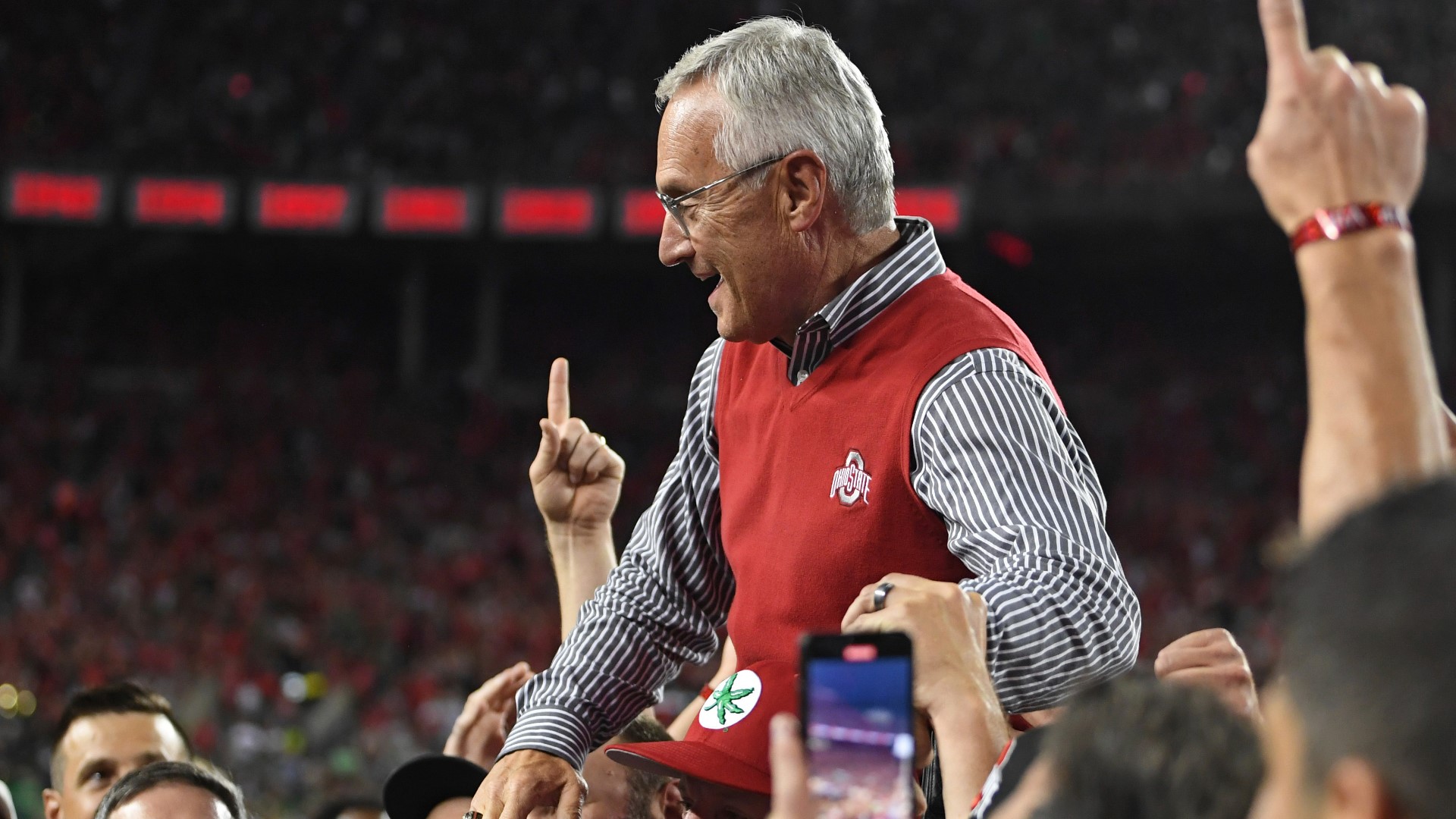 Former Ohio State head coach Jim Tressel and 2002 national championship team was honored Saturday at the game against Notre Dame.