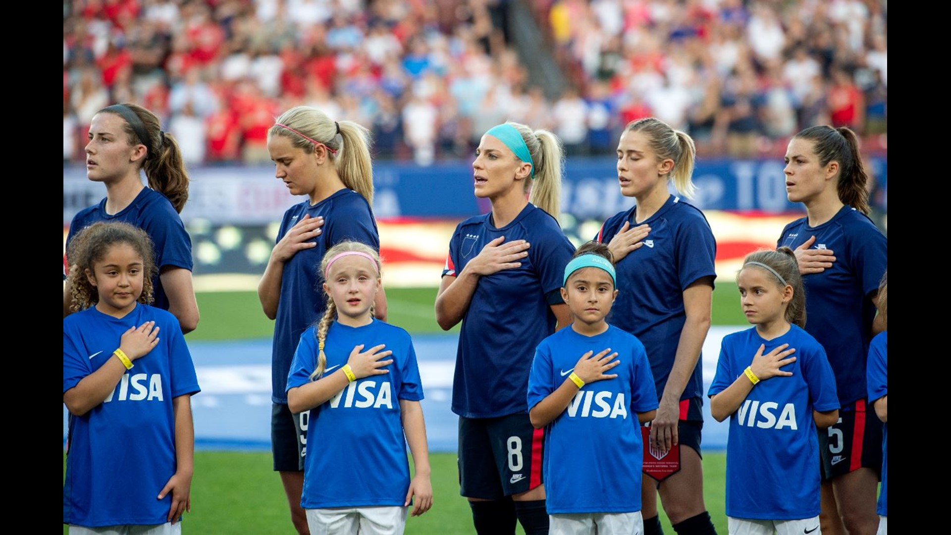 Women's national team hides US Soccer logo during anthem in protest