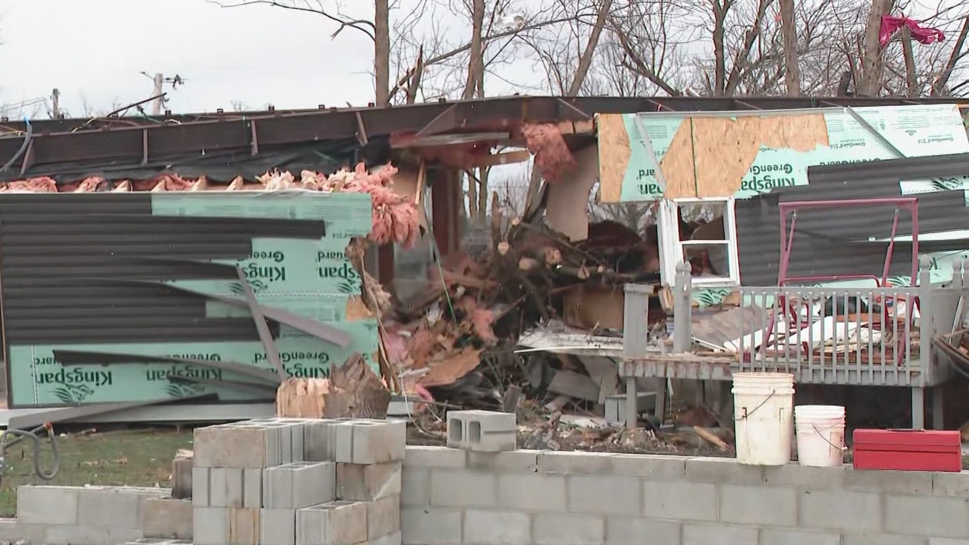 Another mobile home flipped on top of his house during the storm on Thursday night.