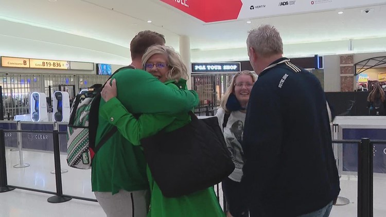 Families reunite at Columbus airport ahead of Thanksgiving