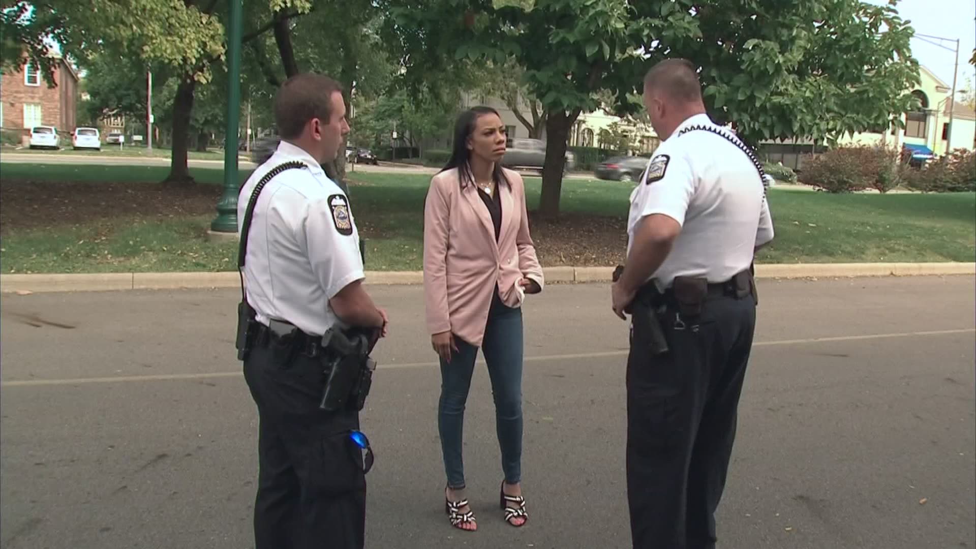 Two Columbus police officers gave a helping hand to a woman when she ran out of gas.