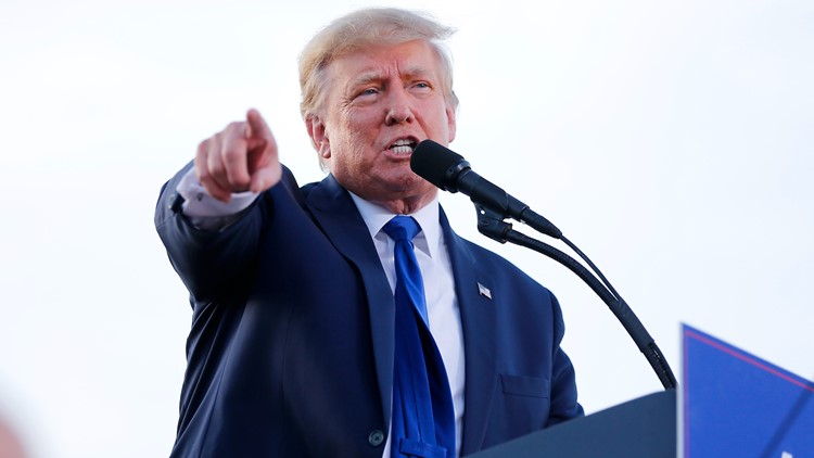 Judge holds Trump in contempt for not handing over business documents