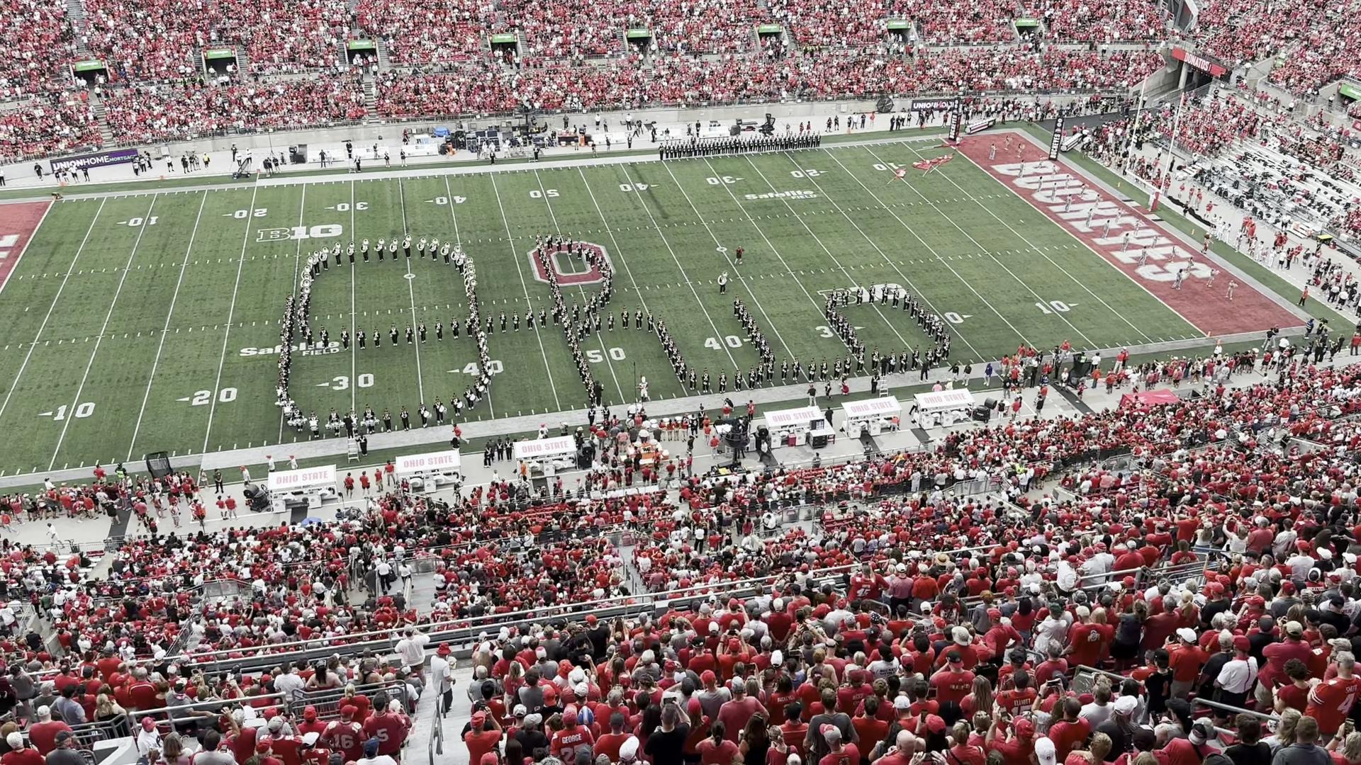 The Ohio State Marching Band performed 'Script Ohio' before the season opener against Akron on Saturday.