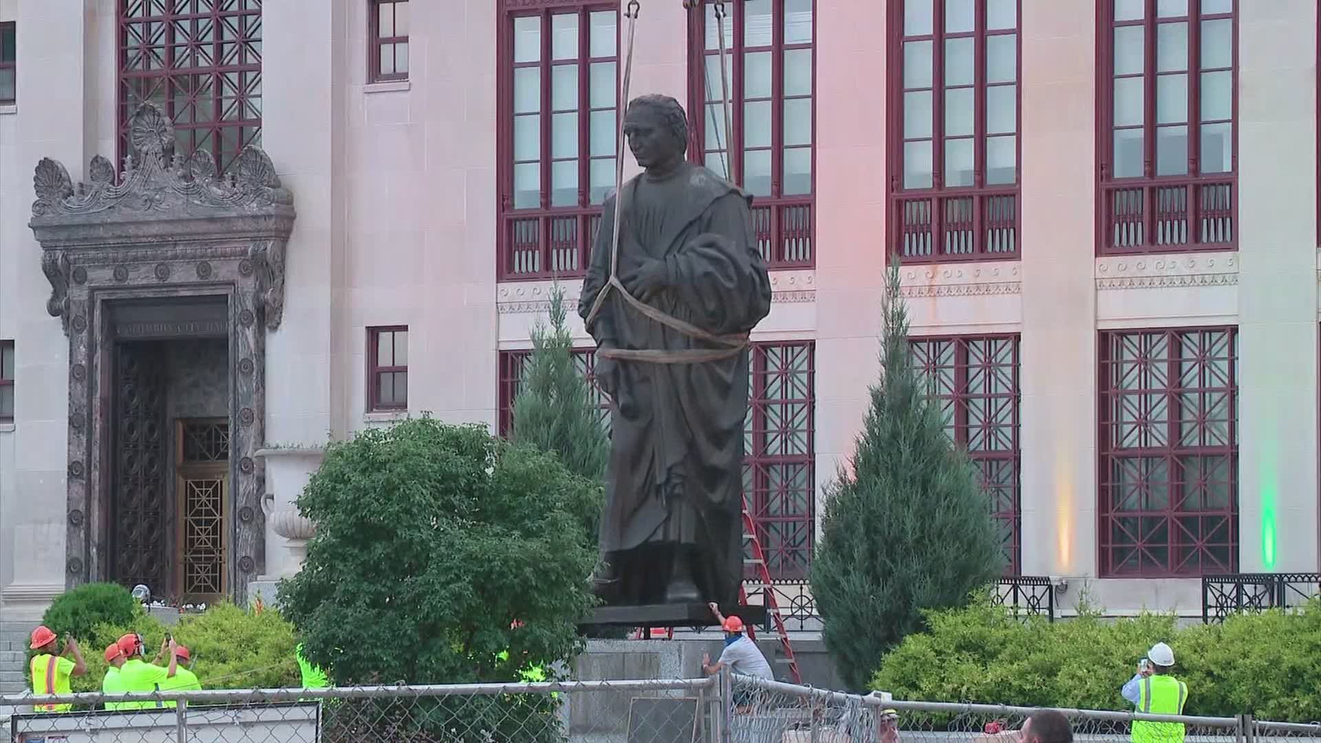 Mixed emotions from onlookers as Christopher Columbus statue is taken down at City Hall.