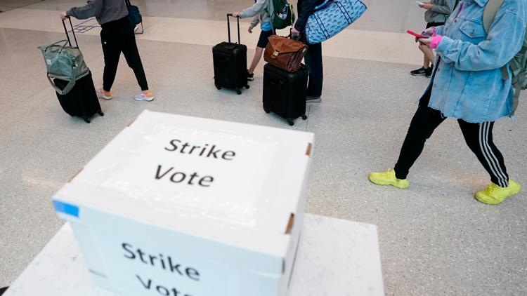 Charlotte airport workers strike at outset of busy Thanksgiving travel week