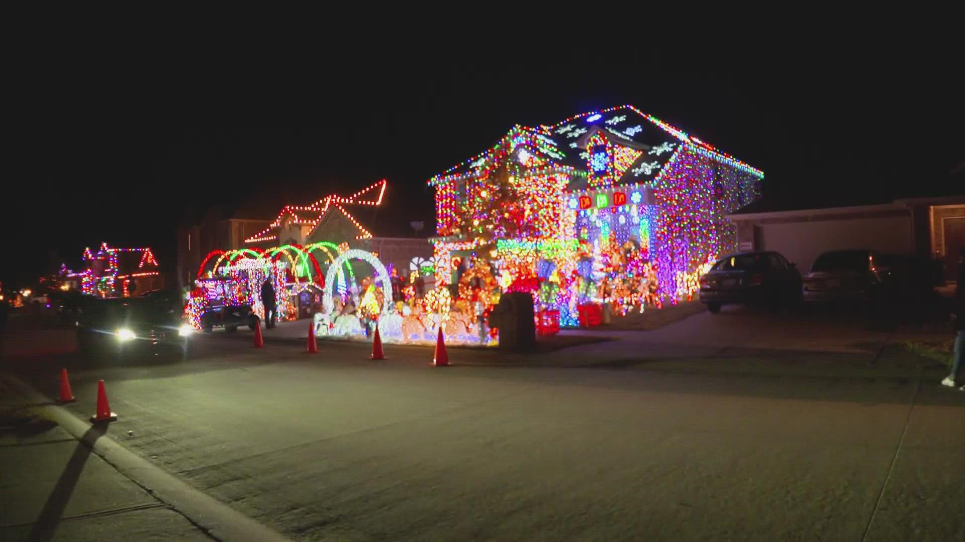 The house features 80,000 lights, 300 holiday pieces arranged carefully on the lawn and an entire Christmas village that now encompasses their entire garage.
