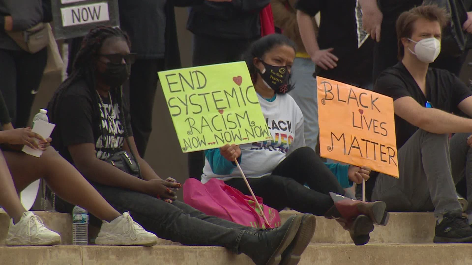 “We see this over and over and over again, and it’s just tiring,” said Nichole Mansfield, speaking in front of a crowd outside Dallas Police Headquarters.