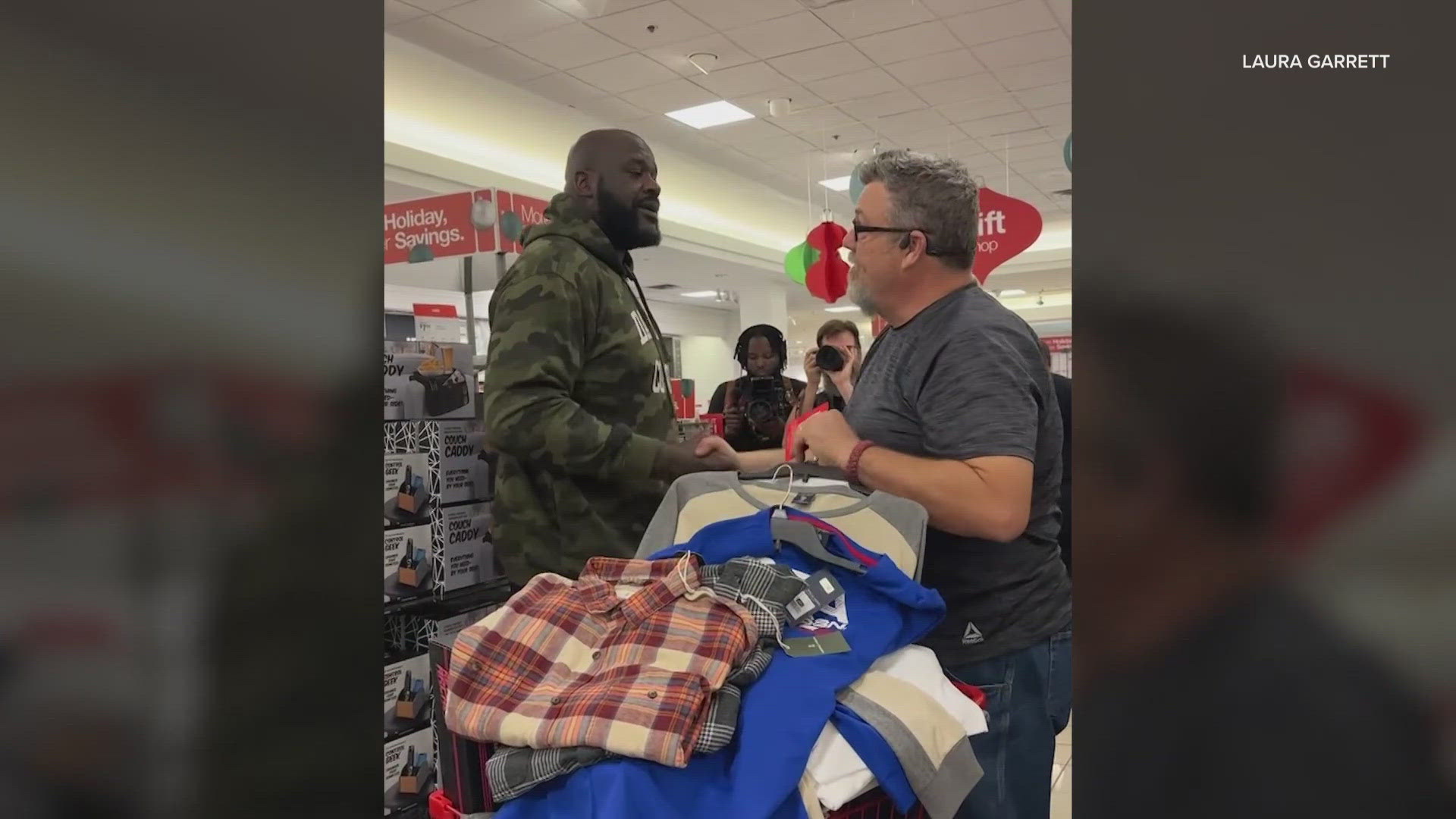 The four-time NBA champion, now a North Texas resident, was surprising shoppers with gift cards at a JC Penney in Arlington.