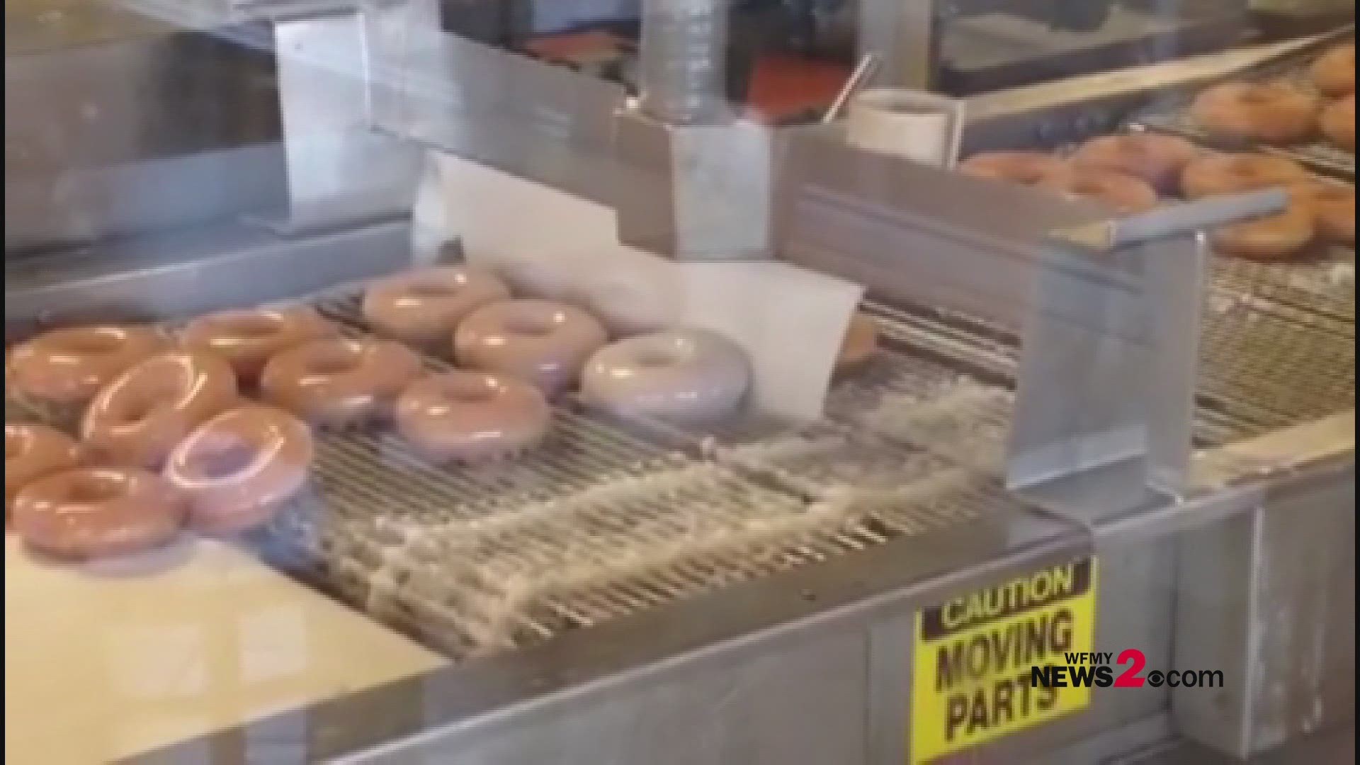 A look at doughnuts being glazed at Krispy Kreme in Greensboro.