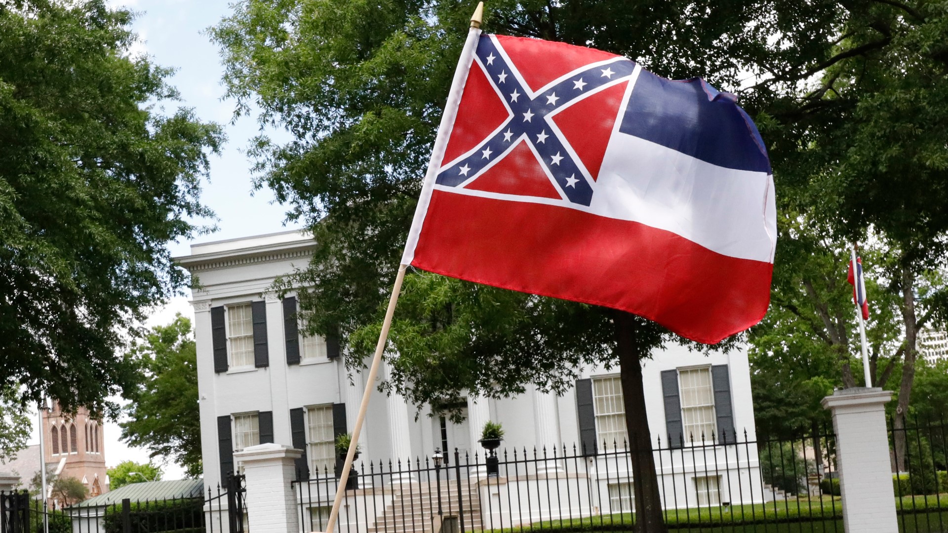 Tuesday, June 30, 2020: Mississippi Gov. Tate Reeves signed a landmark bill that retires the last state flag bearing the Confederate battle emblem.