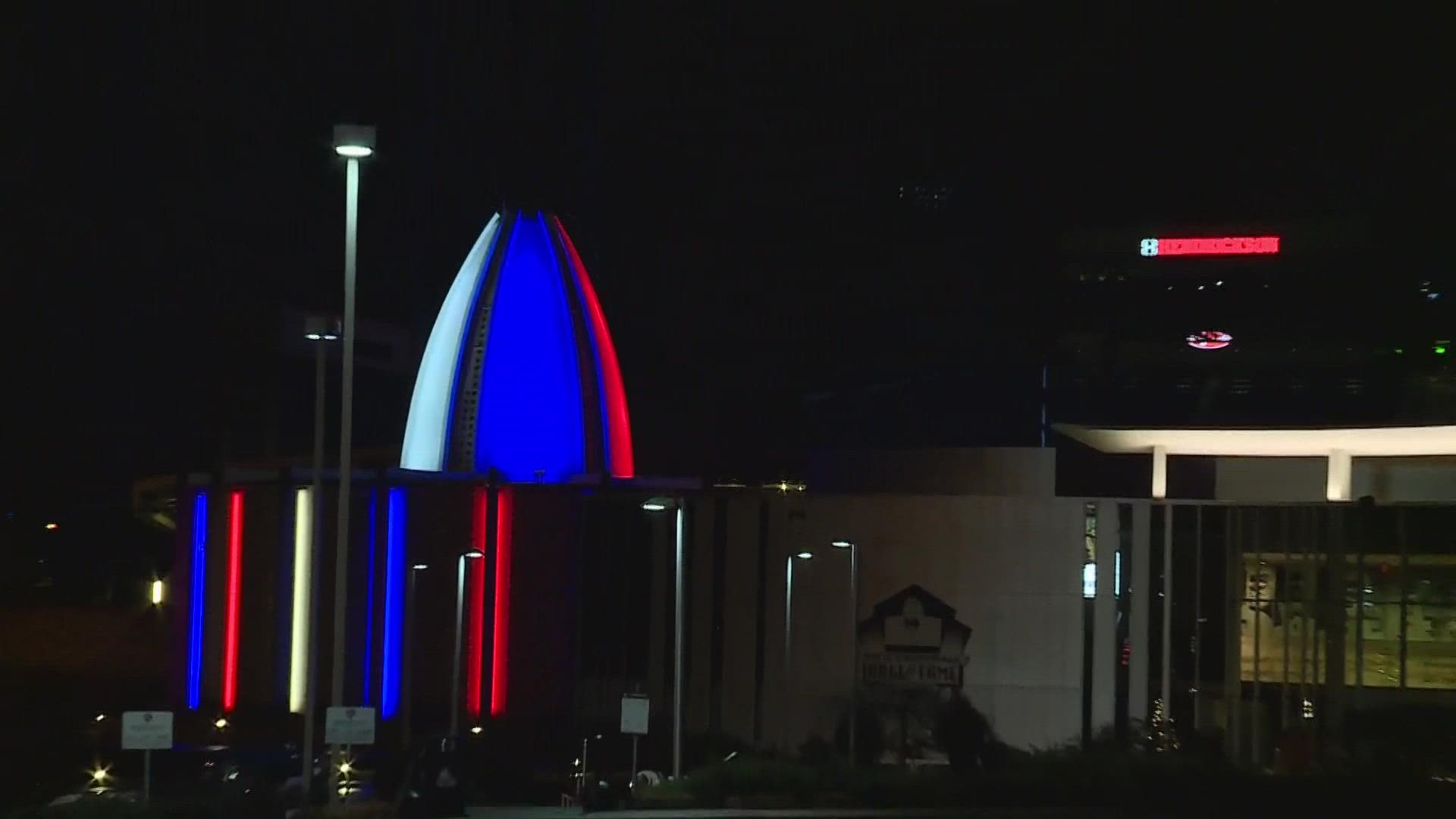 The Pro Football Hall of Fame in Canton is illuminated in red, white and blue to show support for Damar Hamlin and the Buffalo Bills after his collapse on the field.