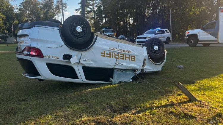 Central Georgia sheriff's cruiser overturns during crash, leaving 2 injured