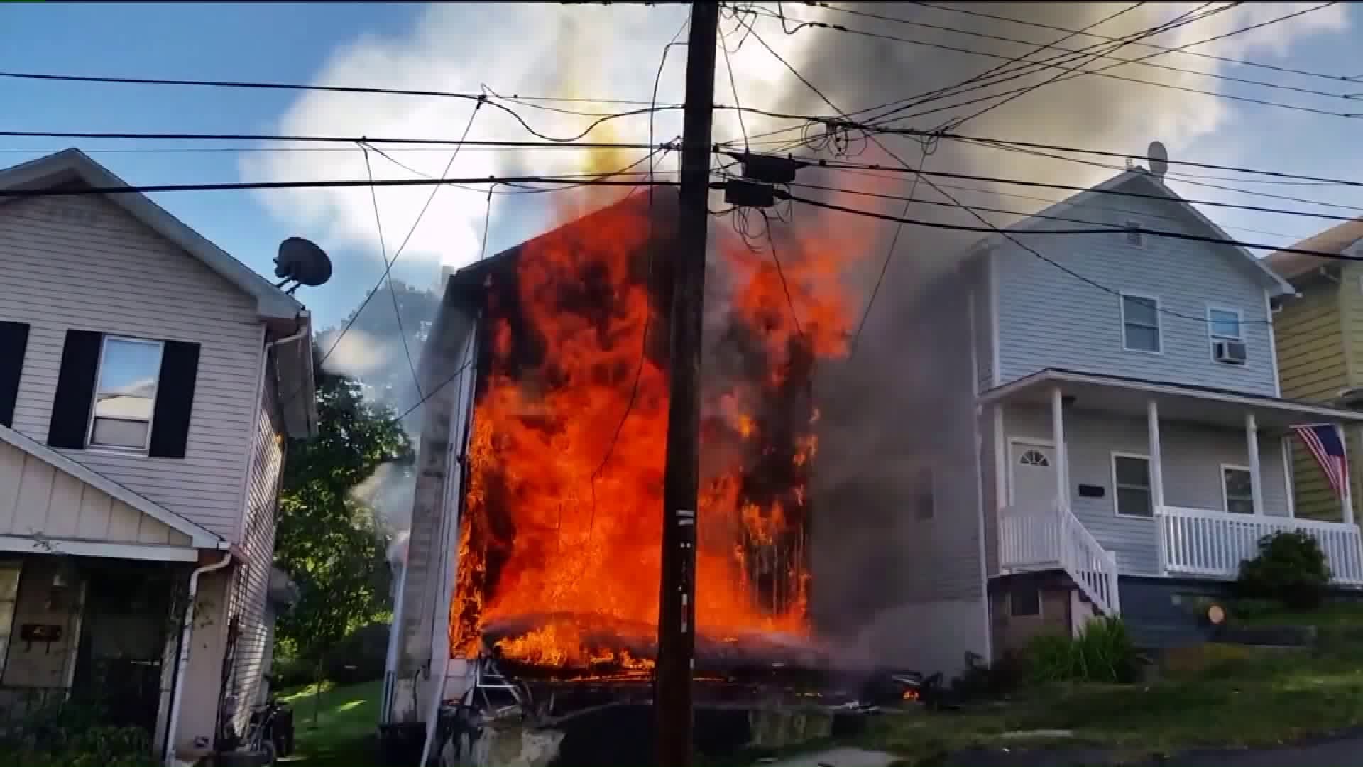Woman Rescued After Flames Engulf Home in Plymouth