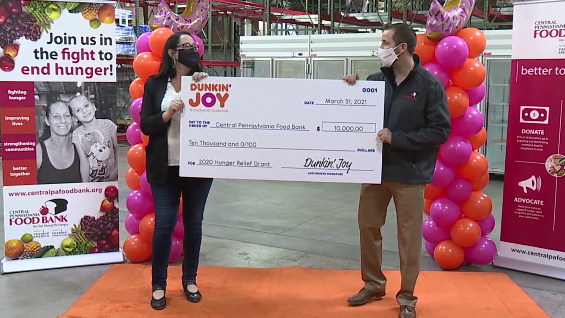 The Dunkin' Joy in Childhood Foundation presented the Central Pennsylvania Food Bank with a $10,000 check.