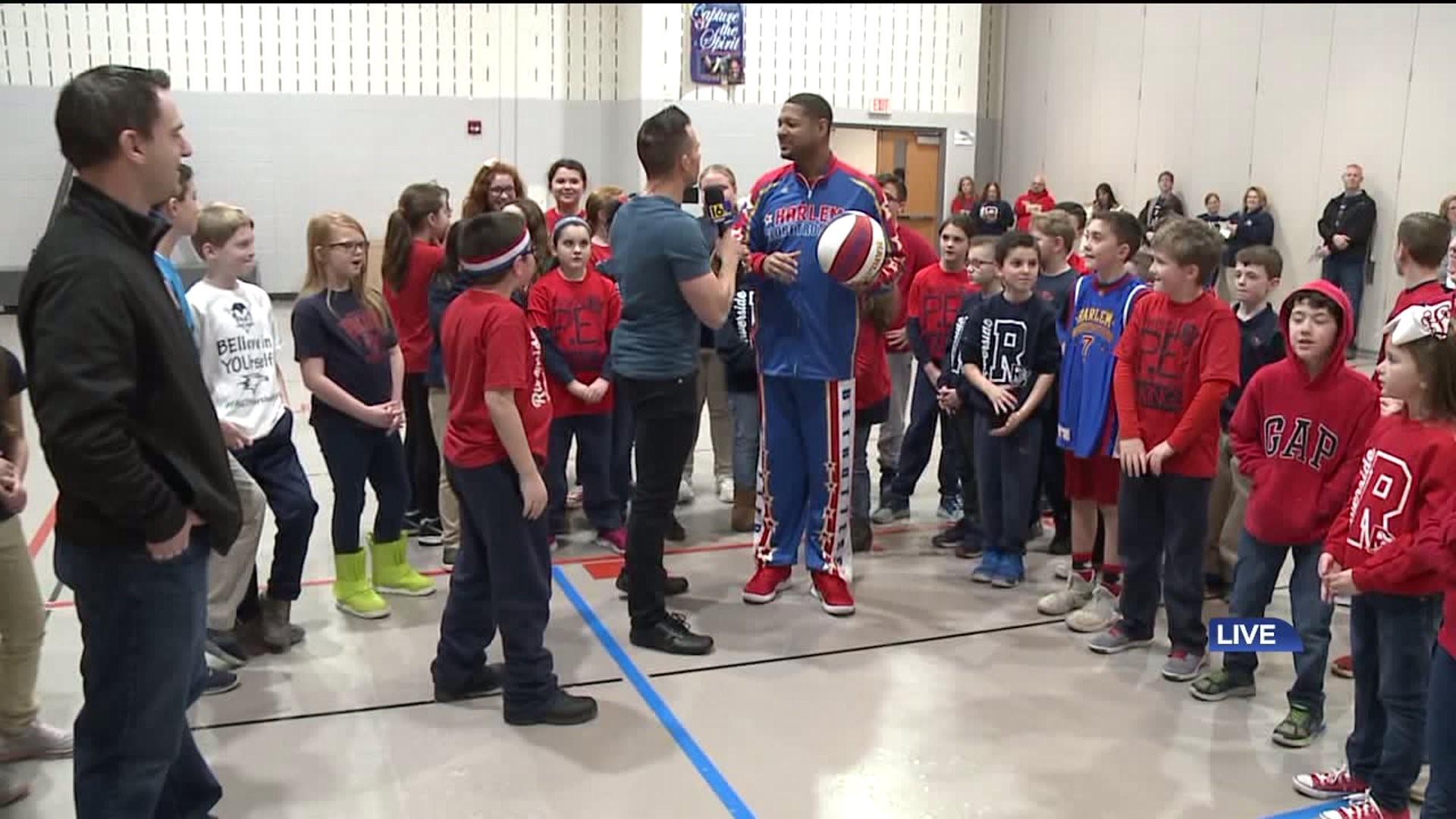 Ryan Leckey Makes Half-Court Shot to Send Kids to See Harlem Globetrotters.
