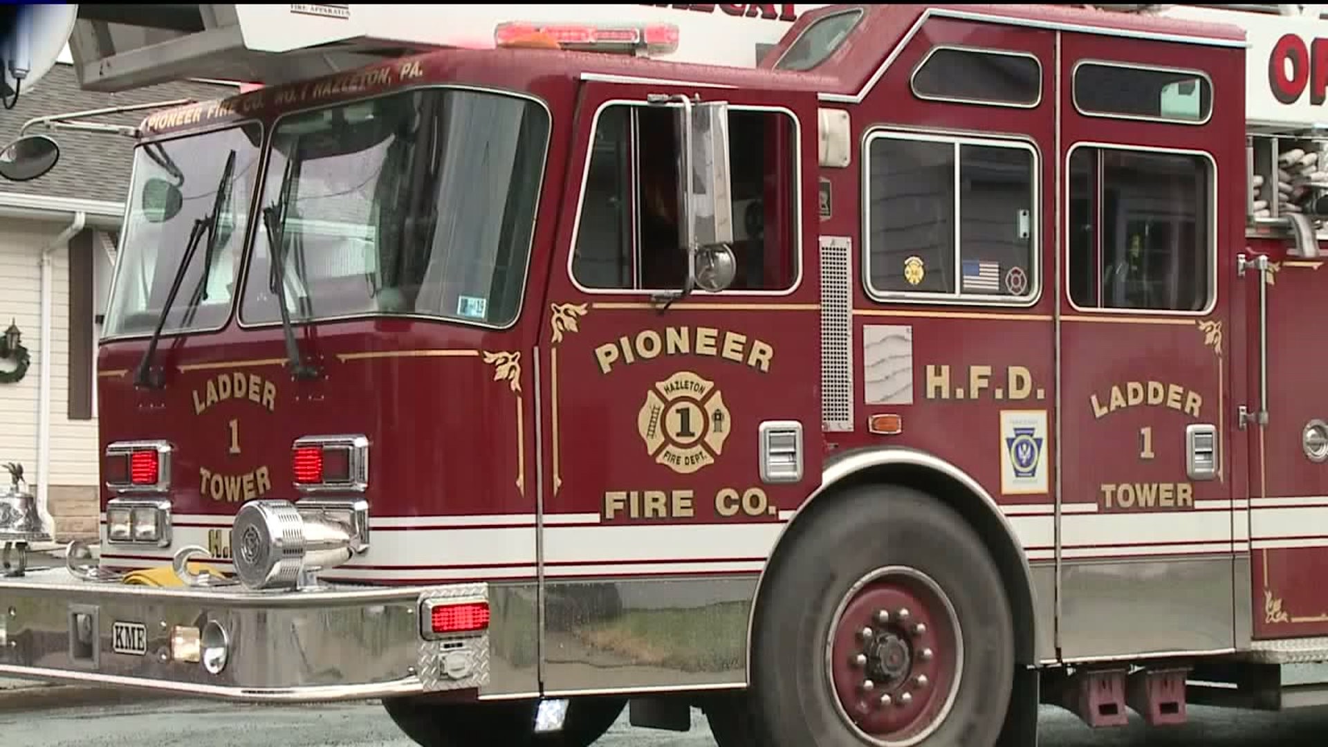 Firefighters Rescue Elderly Woman from Burning Home