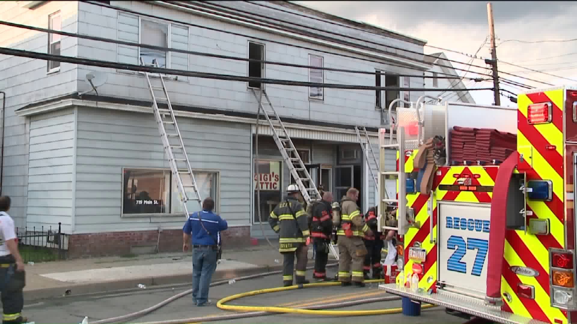 Flames Destroy Garage, Damage Building in Dickson City