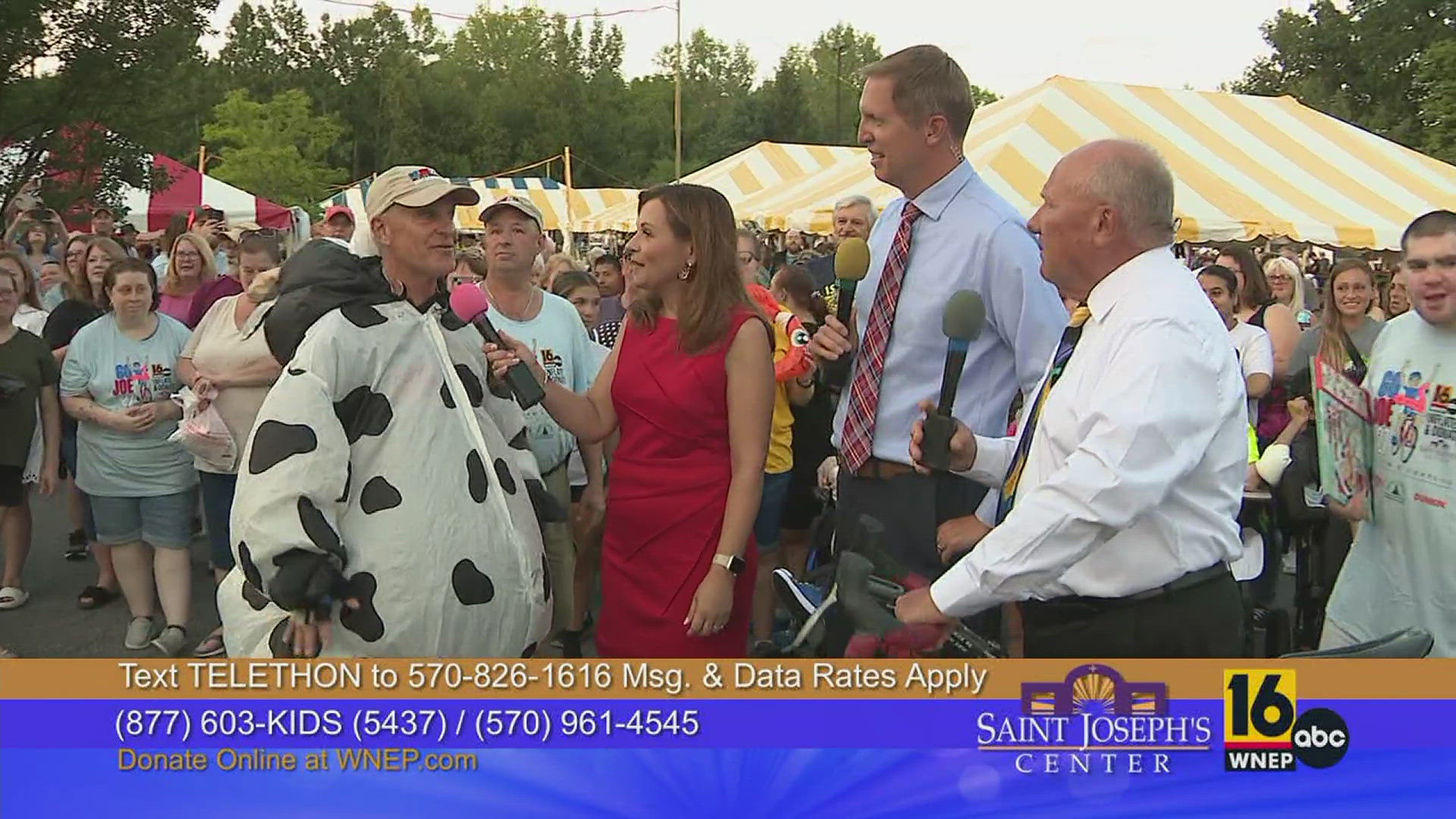 Joe Snedeker caps off Go Joe 27 with this mooo-ving arrival at the St. Joseph's Center Festival.