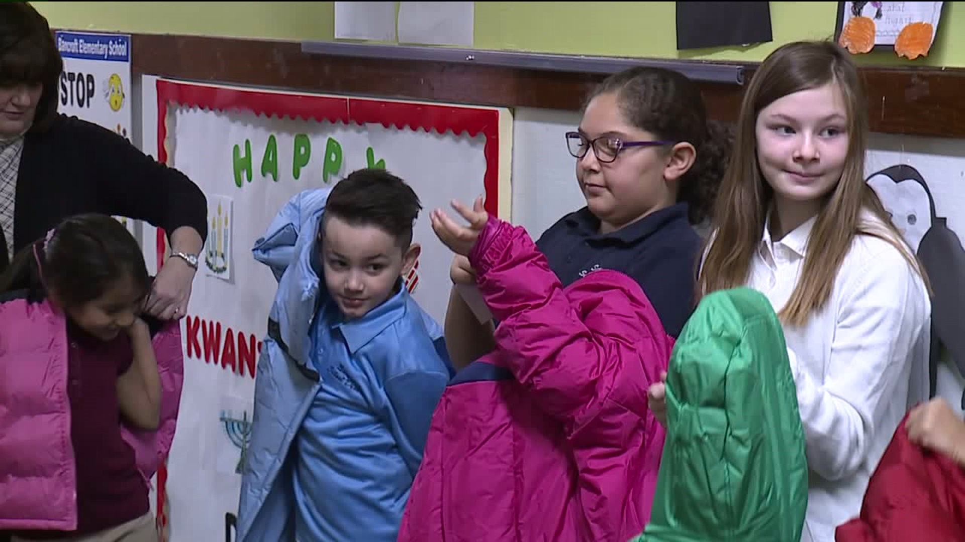 Bundle Up: Church Provides School Children with Warm Holiday