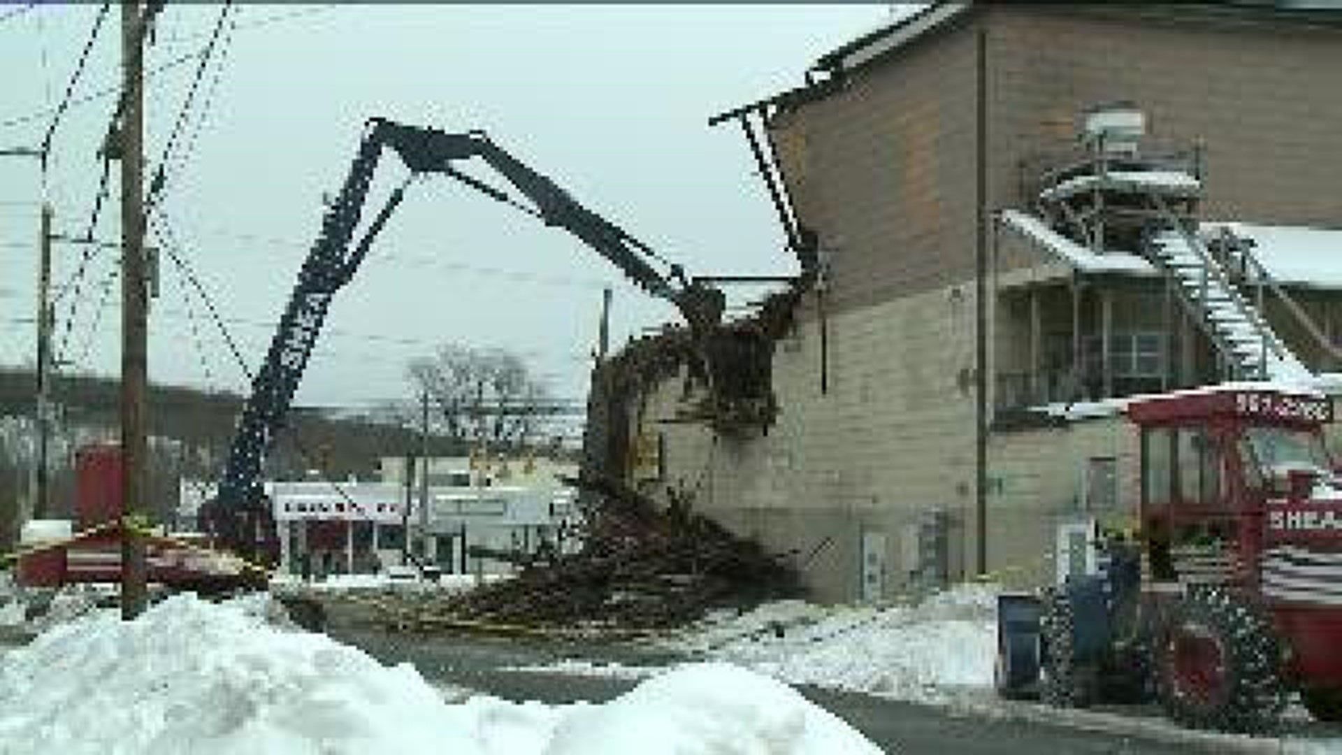 Crews Knocking Down Landmark Building After Roof Collapse
