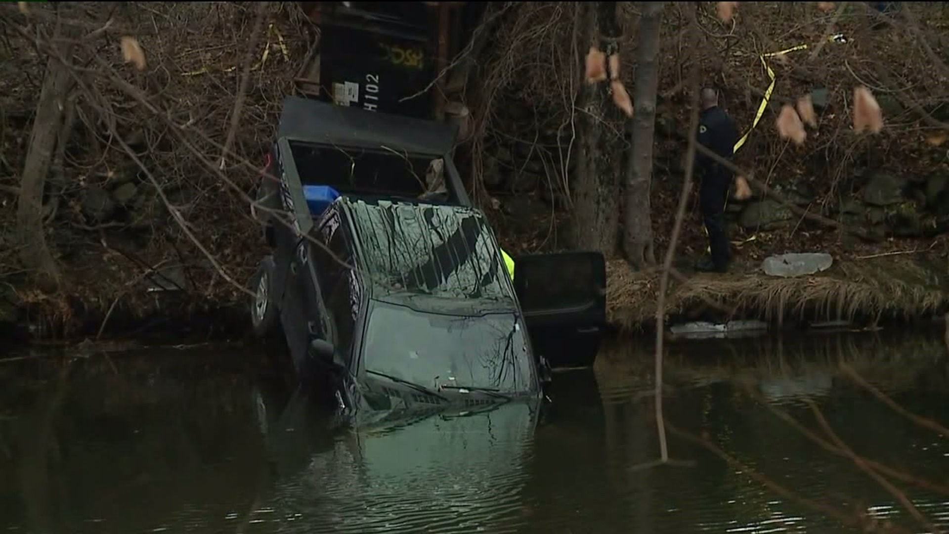 Pickup Crashes into Creek