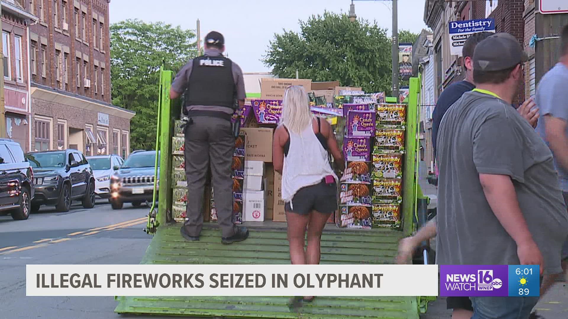 The Olyphant police chief says while the fireworks may not have been illegal, storing them in a building connected to others with no sprinkler system, was illegal.