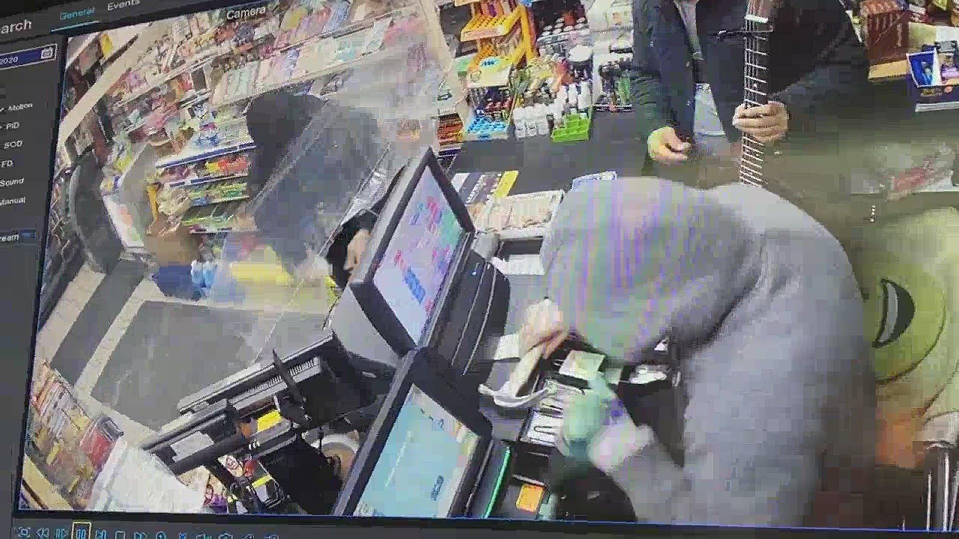 Security camera video and images show the robbery last month, including a distictive tattoo on one of the robbers.