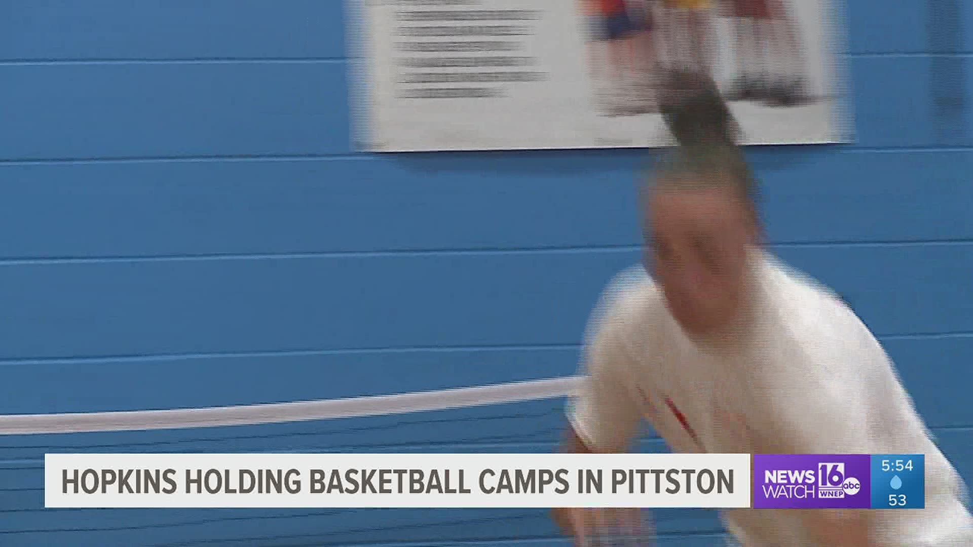 Former Pittston Area basketball star Mia Hopkins is hosting basketball camps back home before resuming her professional hoops career.