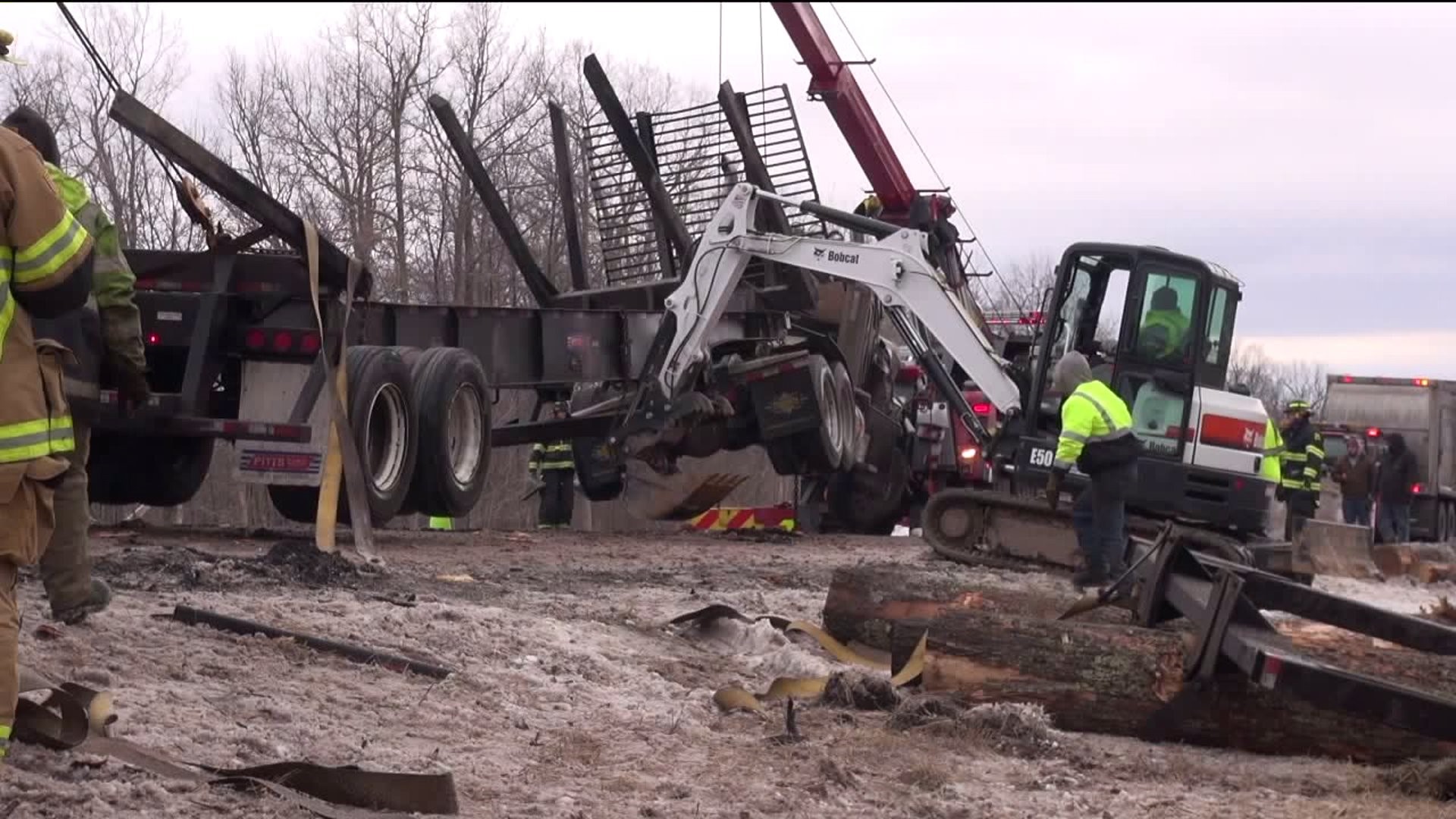 Truck Hauling Logs Rolls off Interstate 84; One of Several Crashes Monday