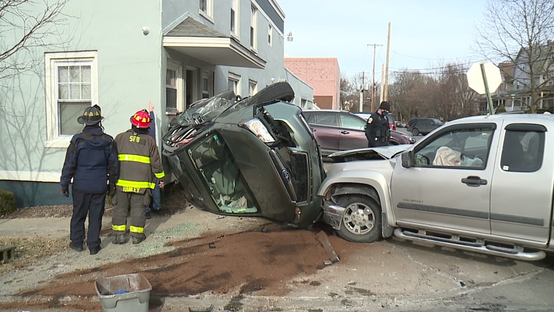 A pickup truck and car collided at an intersection in Scranton; both vehicles hit Industrial Electronics.
