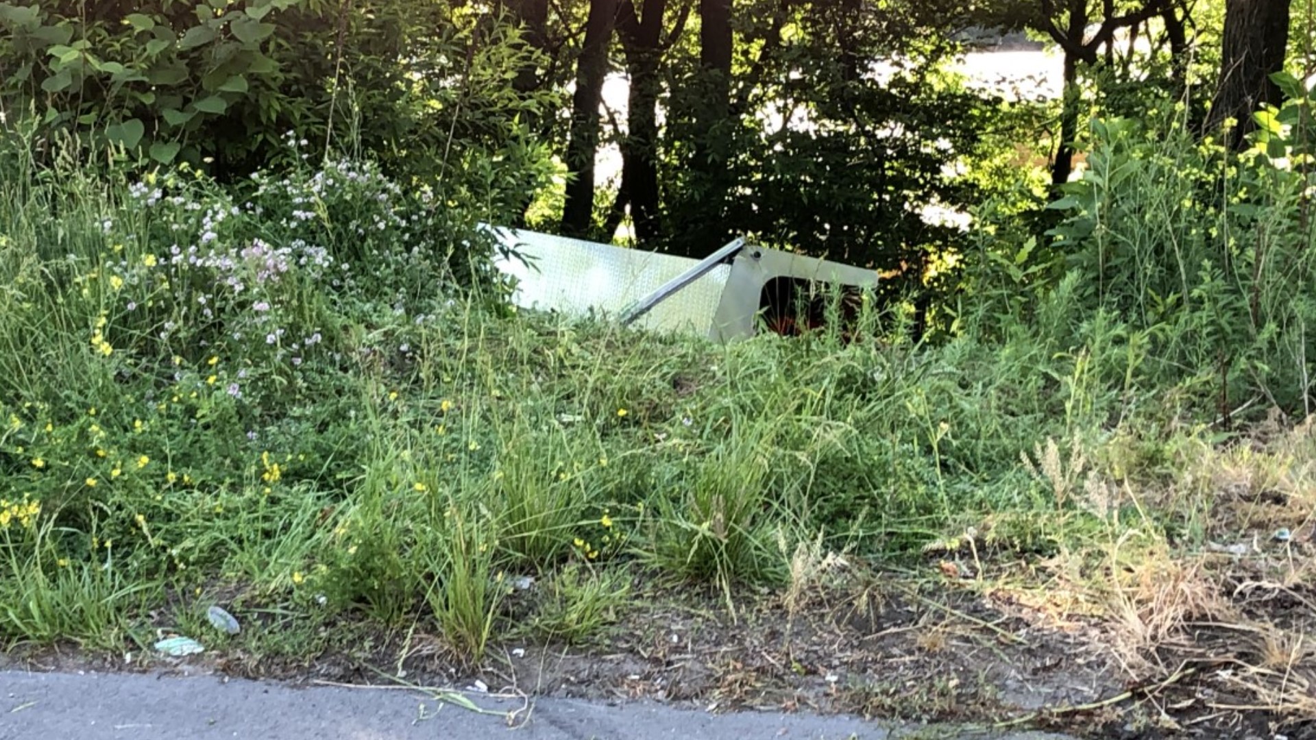 The truck rolled on the North Scranton Expressway (Route 11) and went over an embankment just before 8 a.m. on Tuesday.