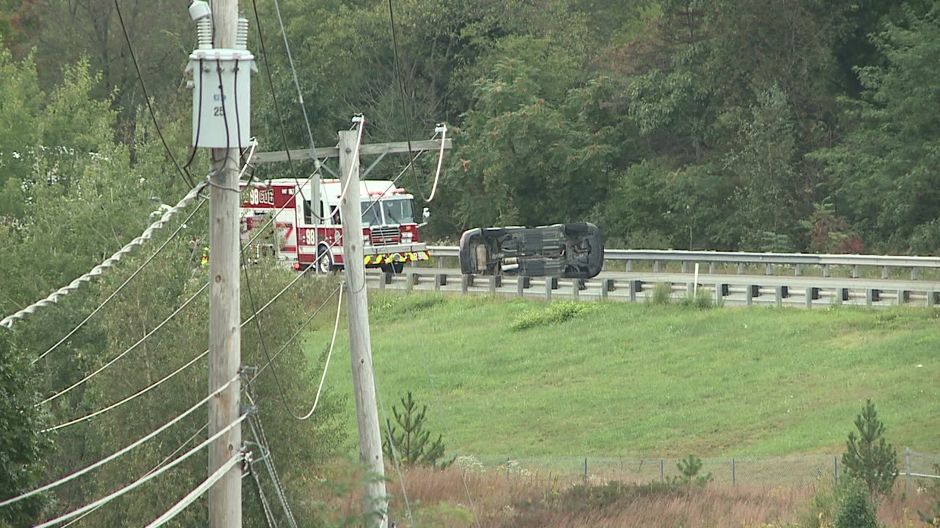 A car on its side shut down one lane of I-81 north in Moosic.