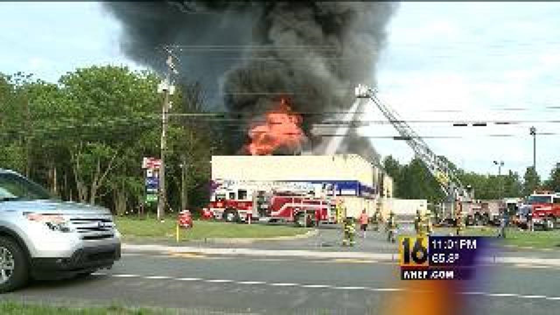 Flames Tear Through Auto Center