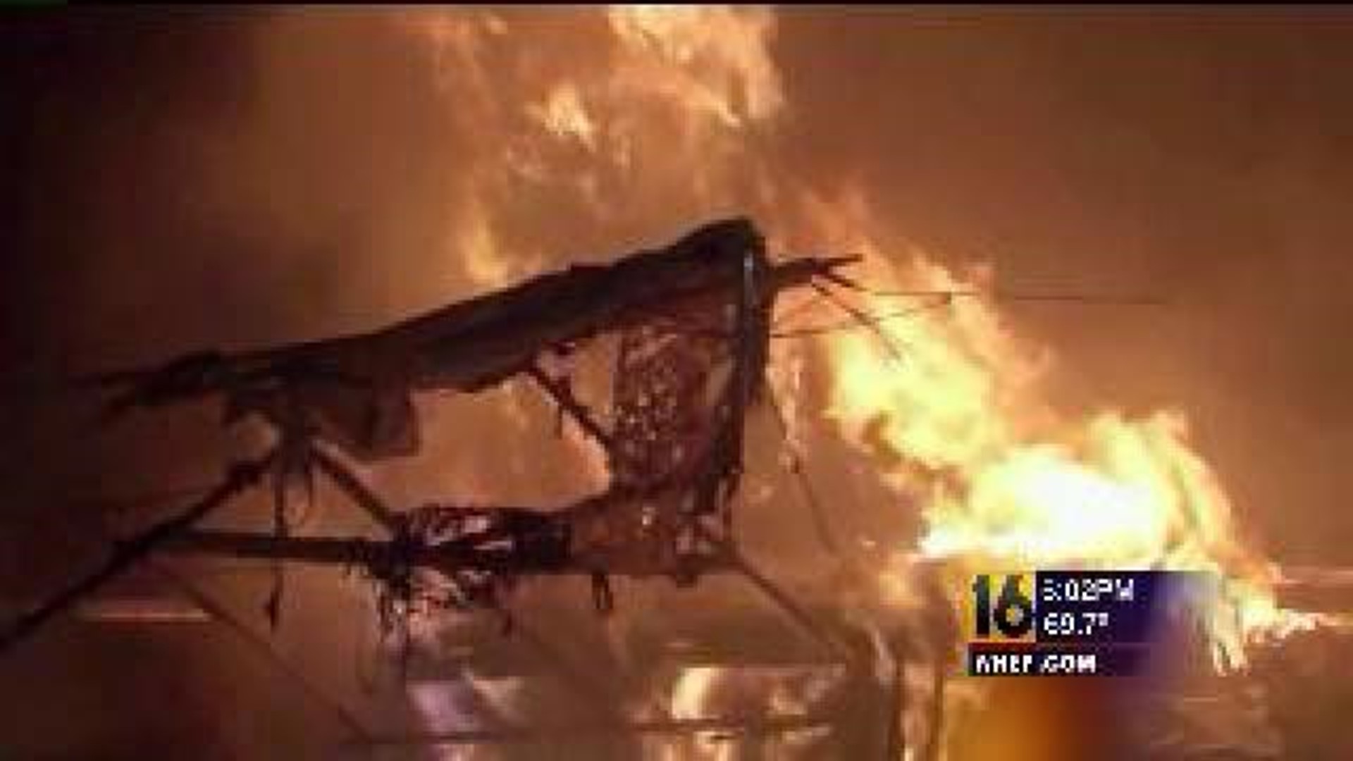 Neighbors Save Woman, Dogs From Fire