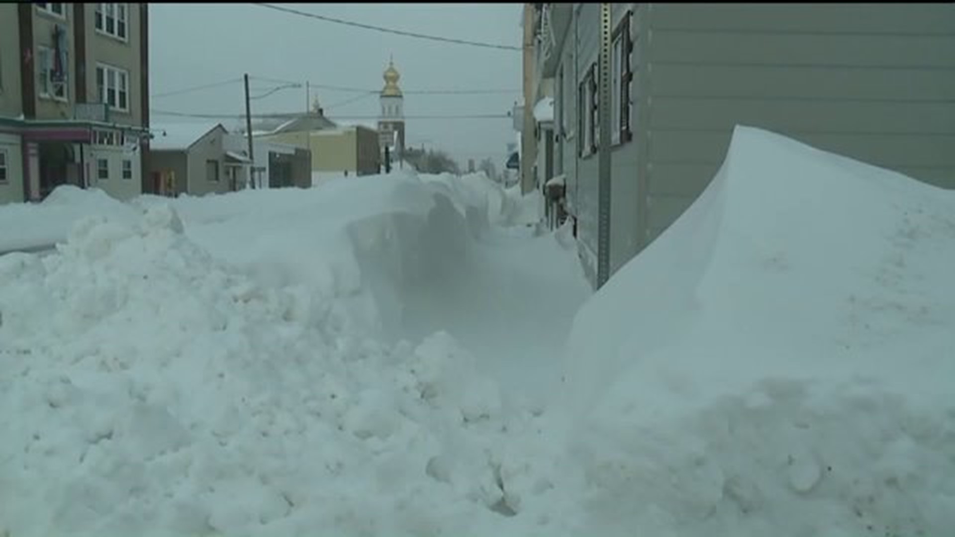 Snow Piles Higher Than People Can See in McAdoo