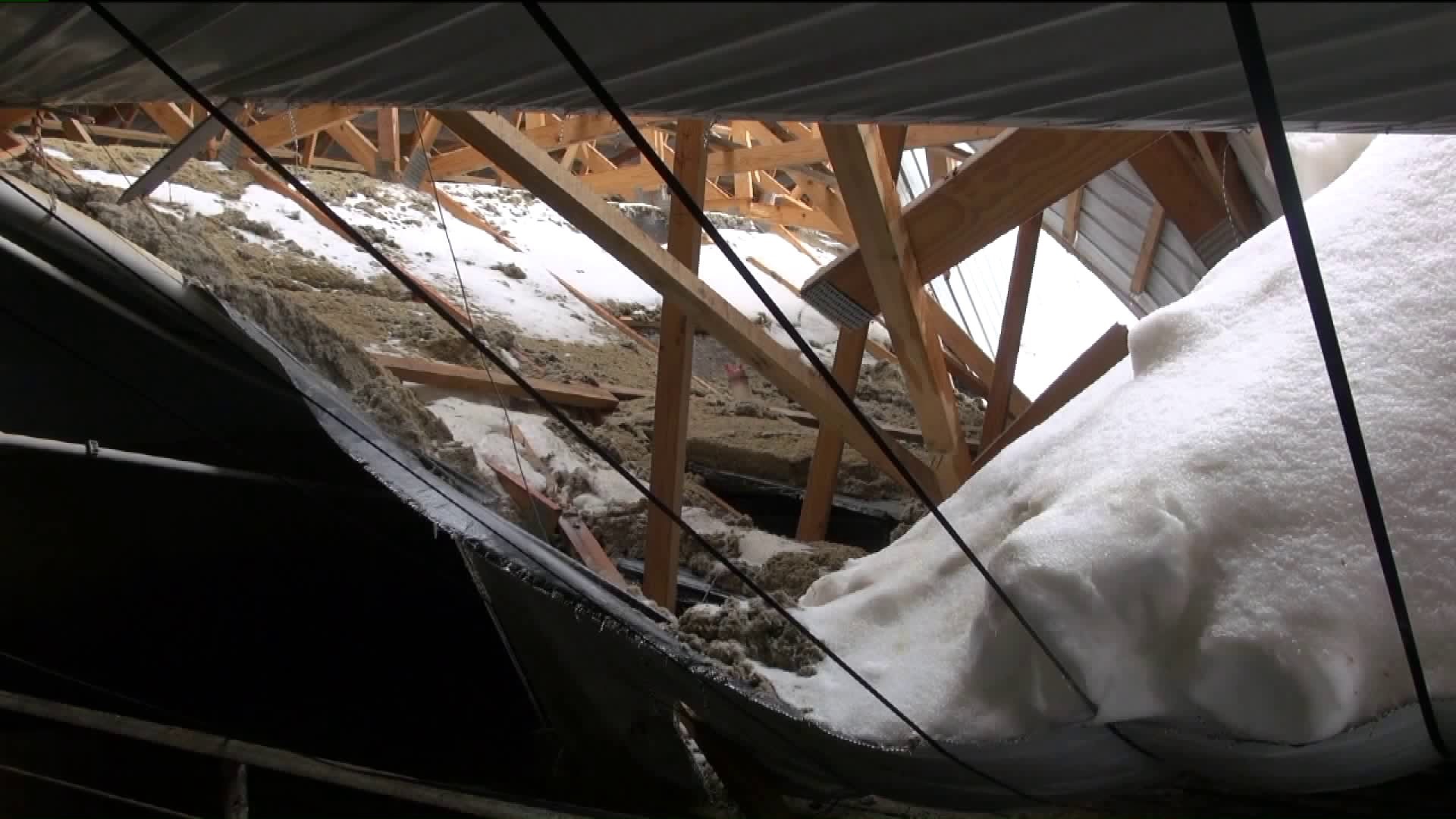 Heavy Snow Causes Barn Roof to Collapse, Trapping Farmer