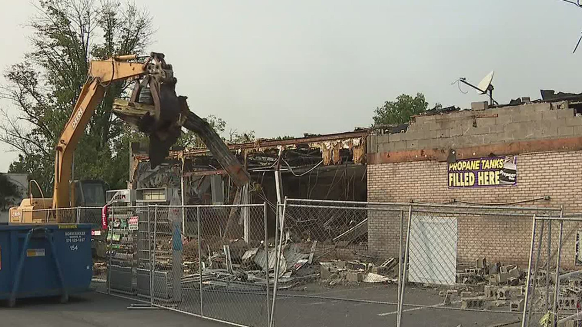 Demolition started Wednesday on a former beer distributor in the Poconos.