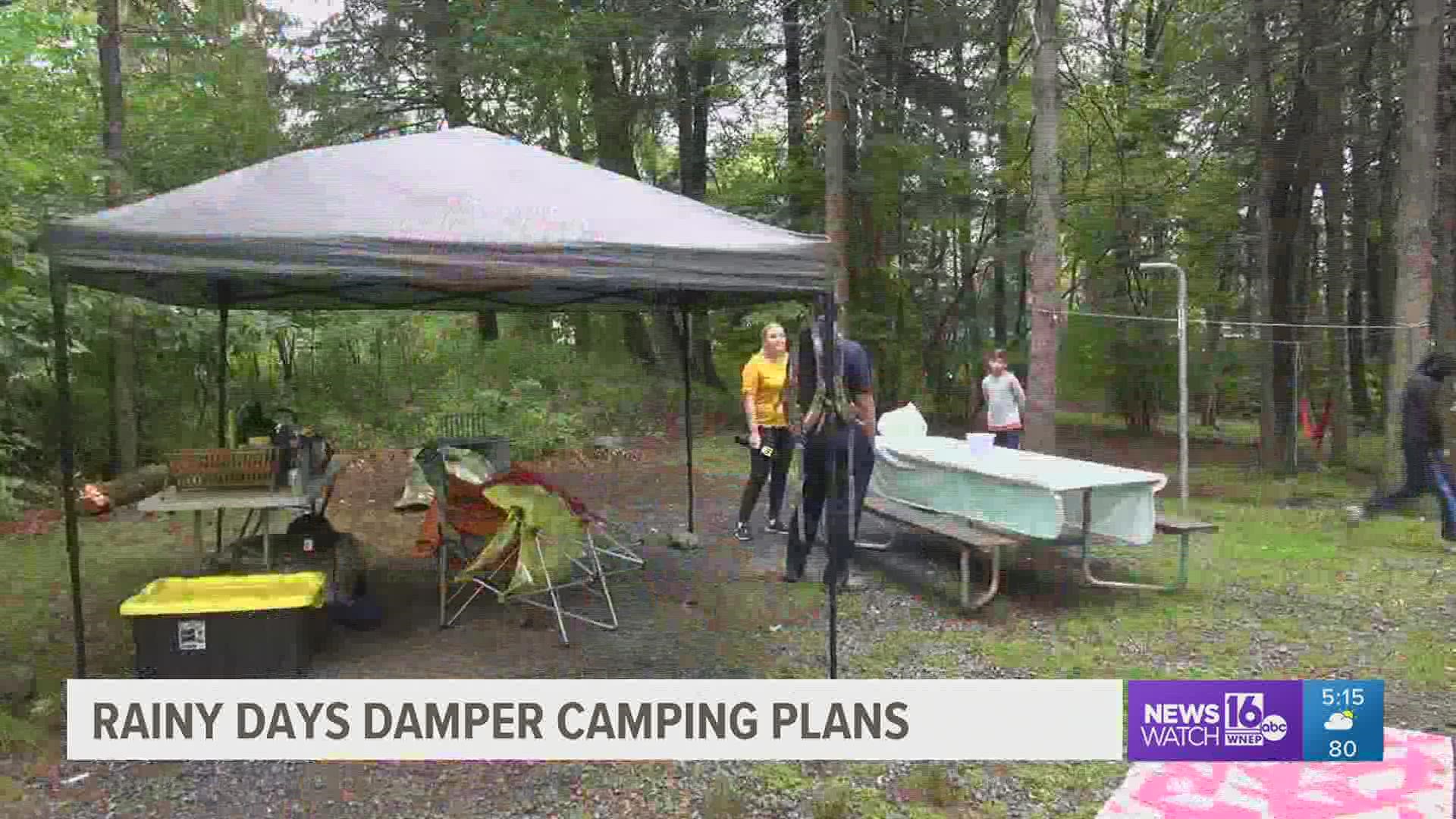 As the summer winds down, people are trying to get in some last-minute vacation time camping, despite the rainy forecast.