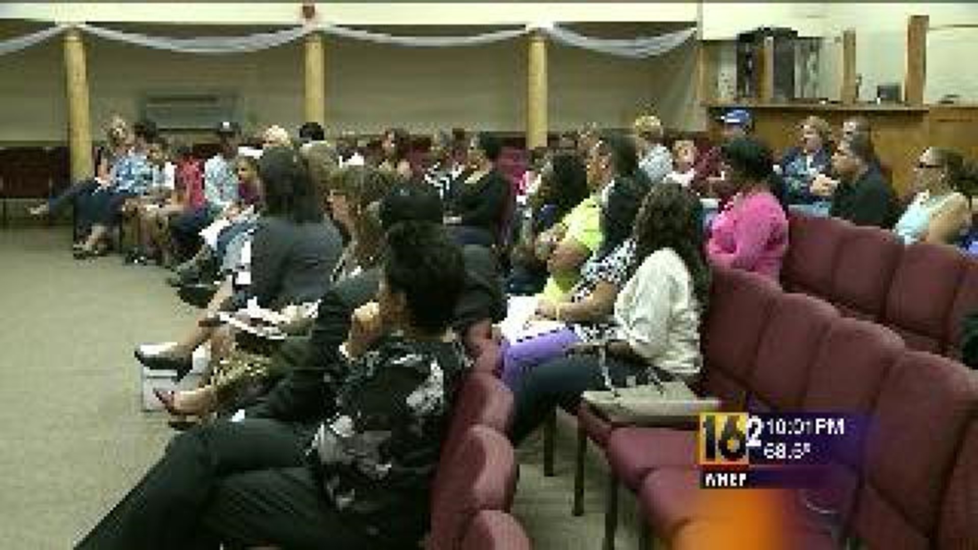 Parents React At Charter School Board Meeting