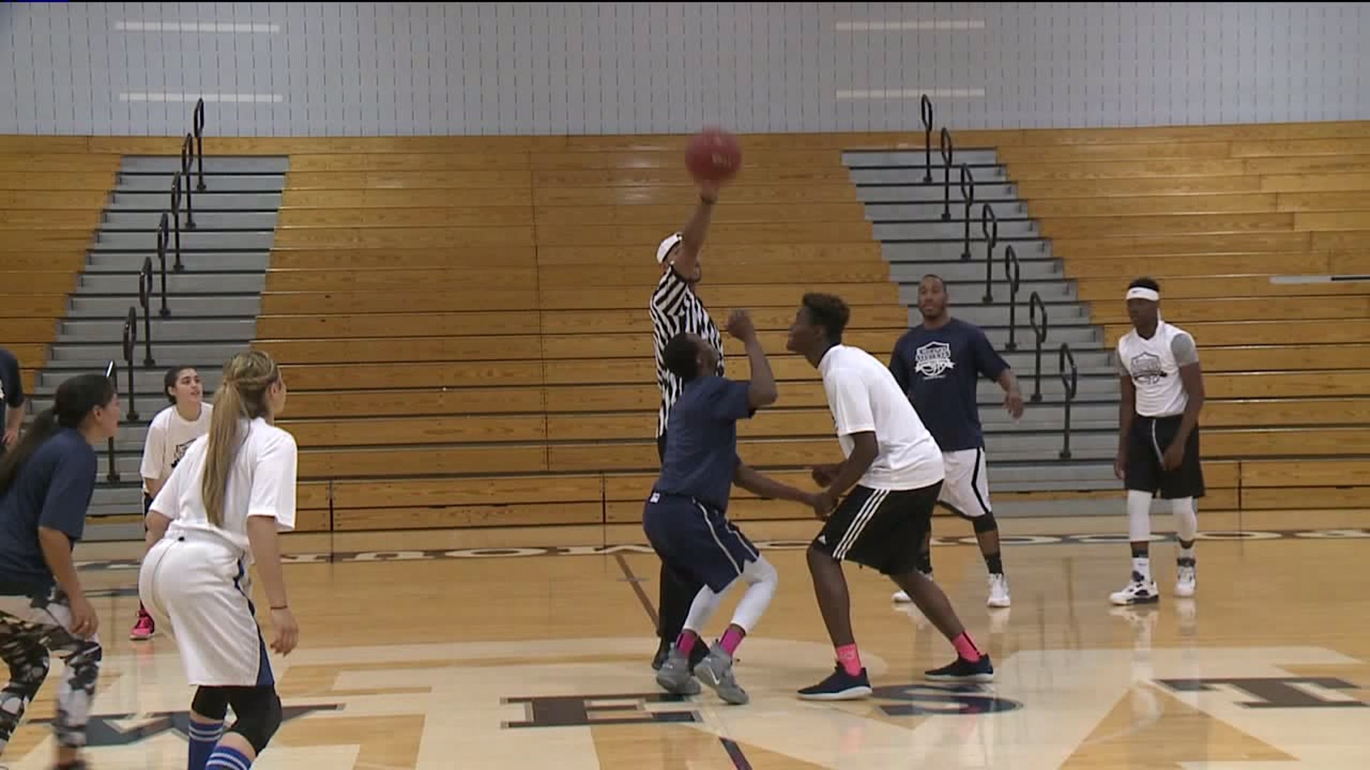 Students Take on Police on Basketball Court