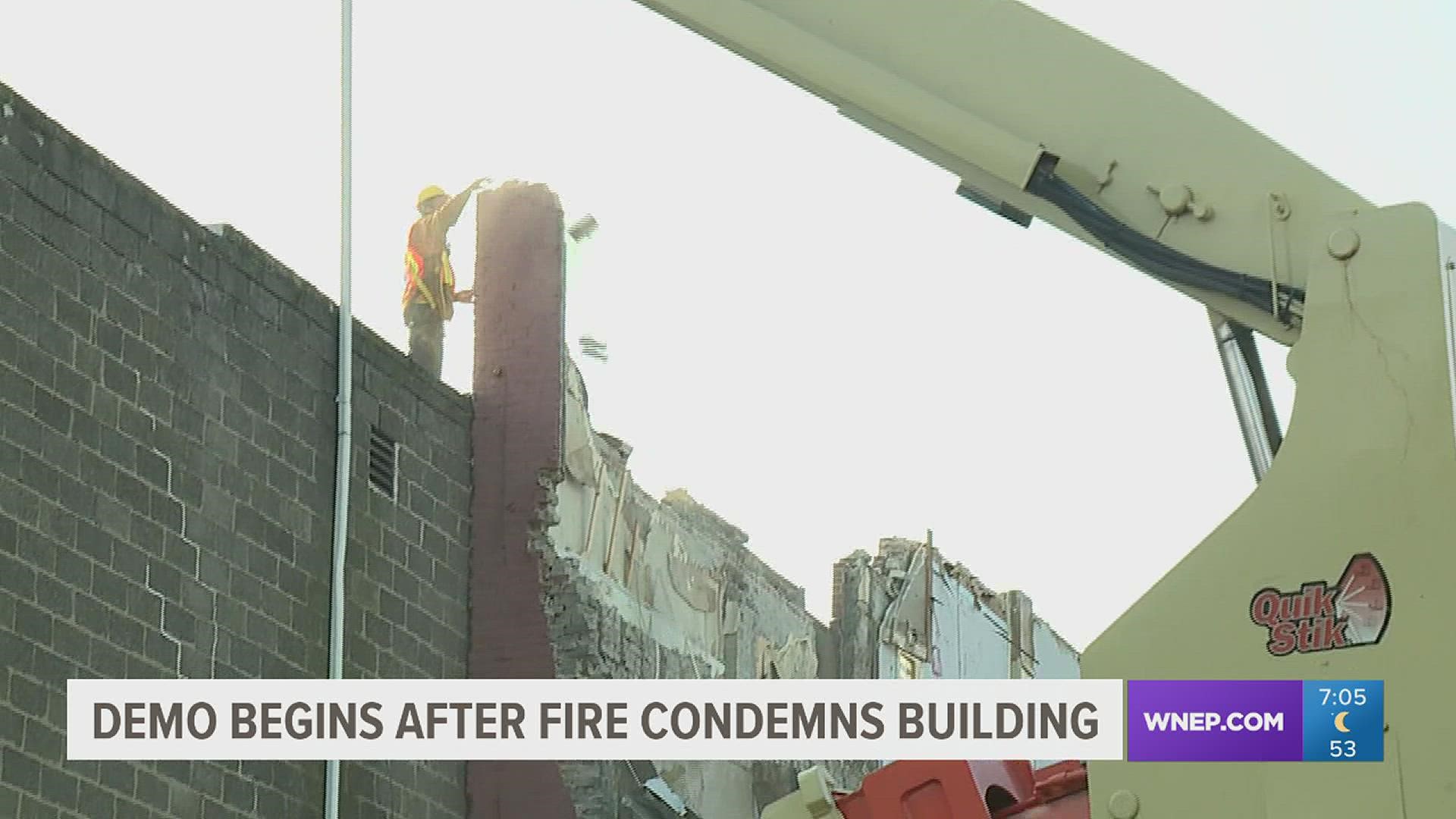 A building heavily damaged by fire back in April is coming down.