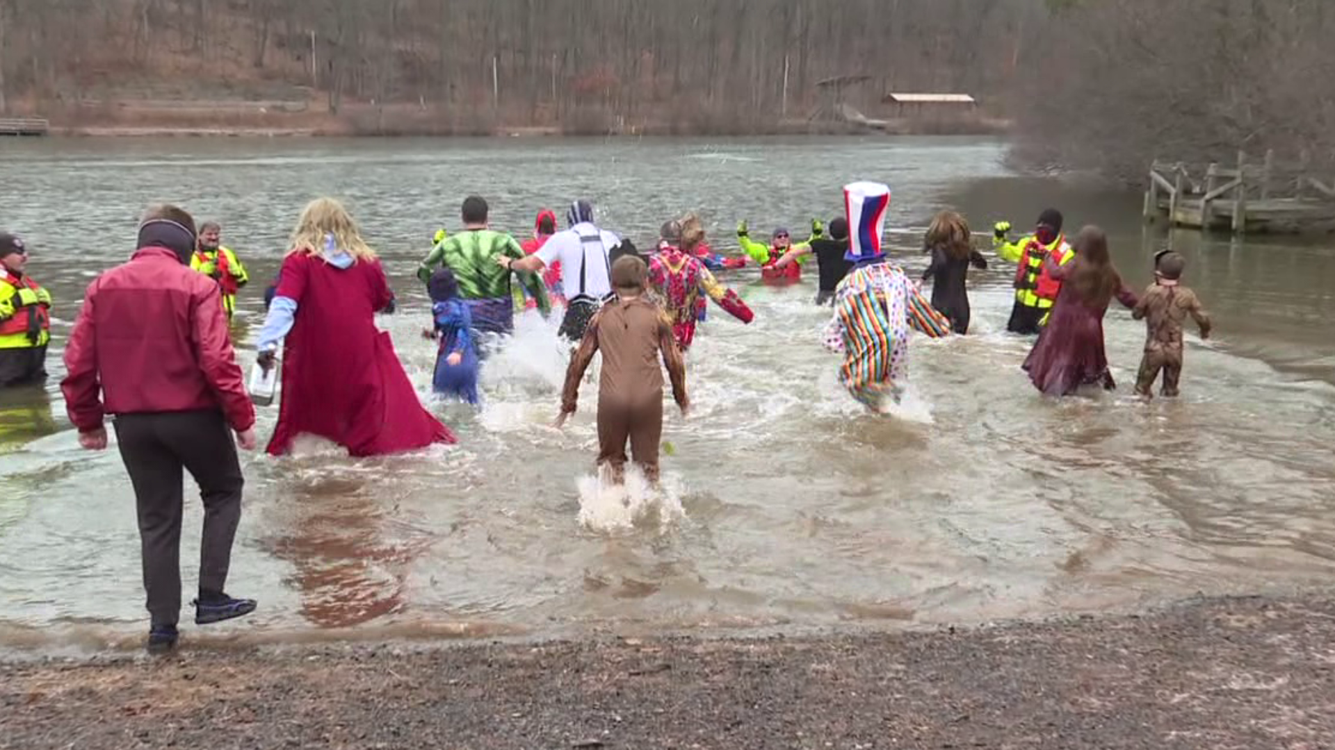 Frigid temps and cold water didn't stop people from taking a dip to raise money for Boy Scouts.